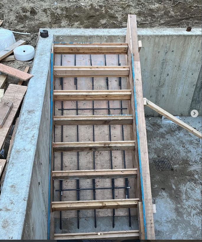 Tony's concrete stair formwork and rebar before the pour by Tarak Construction