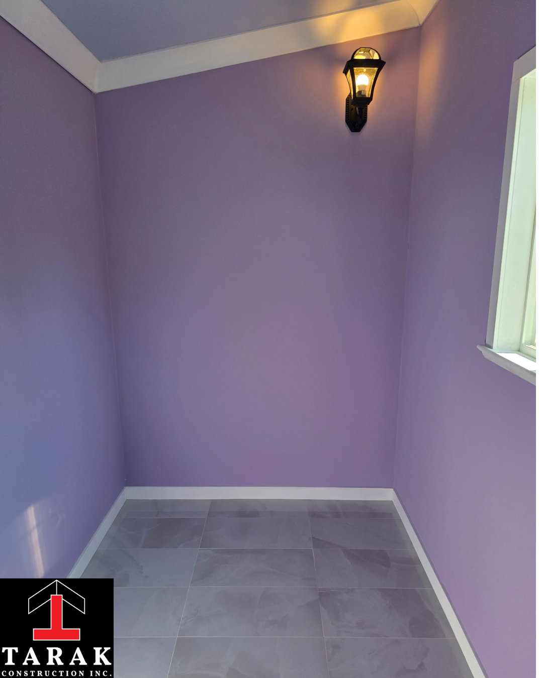 Mike's shed interior with wall sconce lighting and tile floor