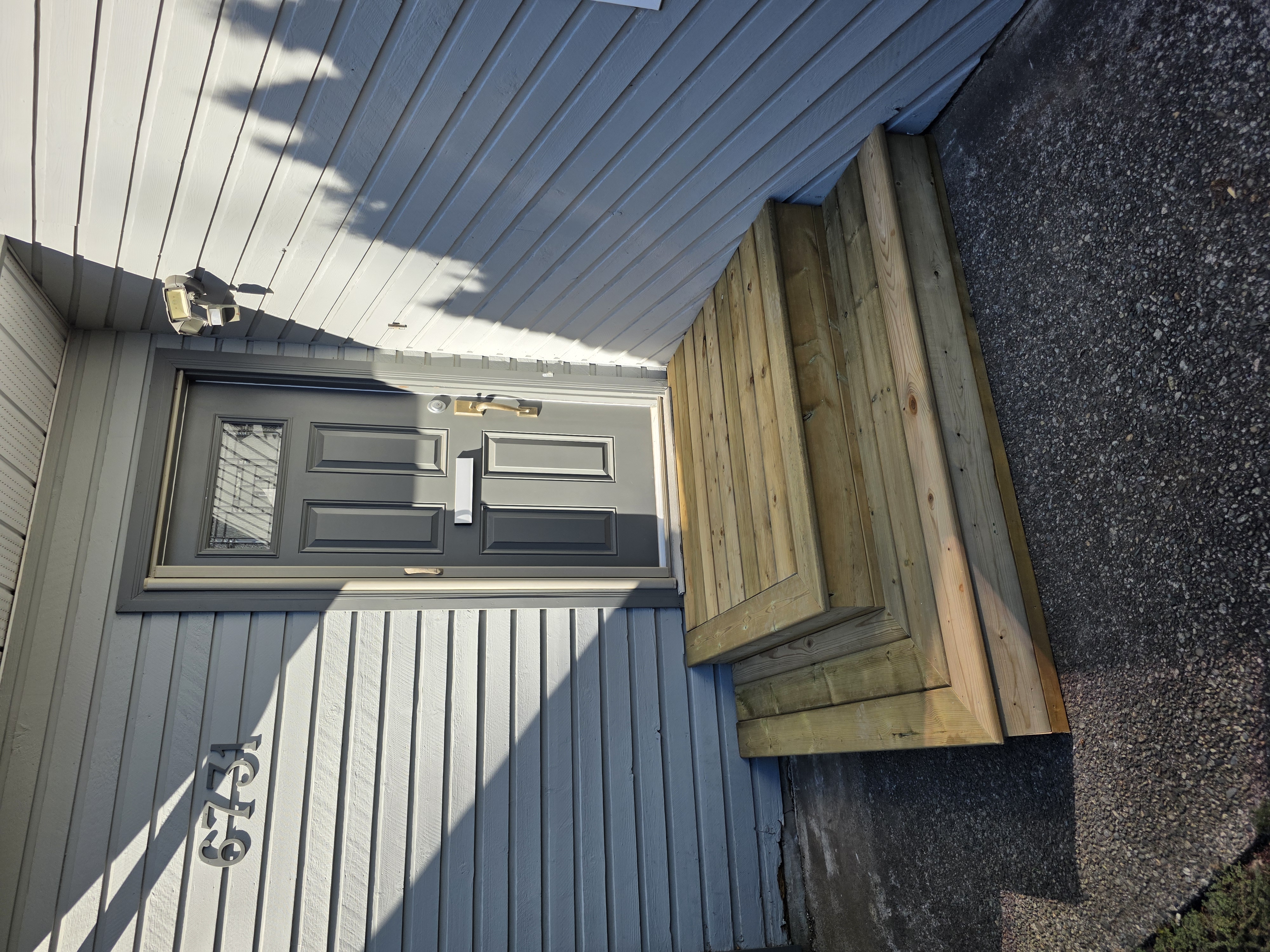 Paul's front door landing with waterfall steps by Tarak Construction