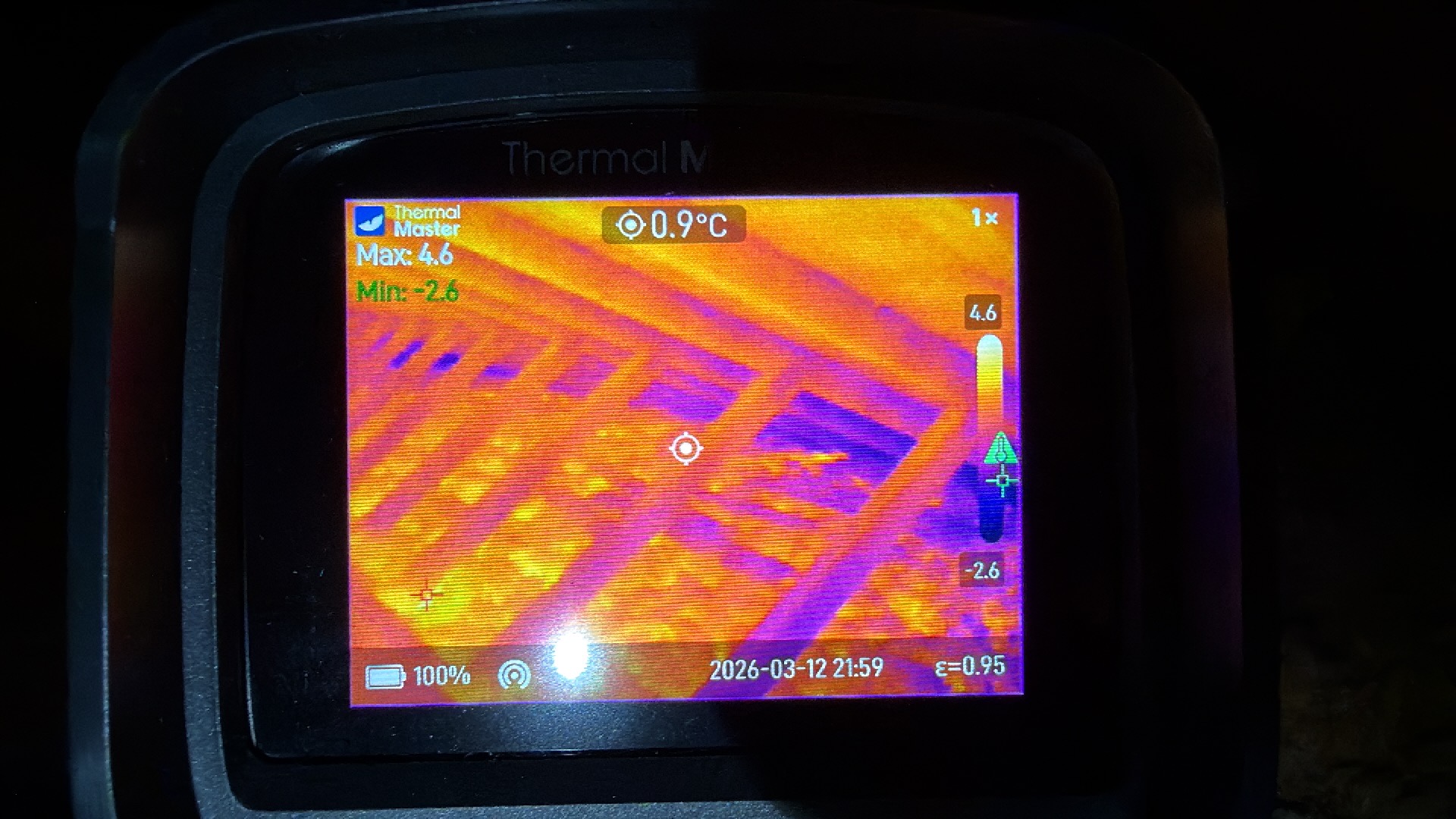 Thermal image showing attic heat loss through missing insulation