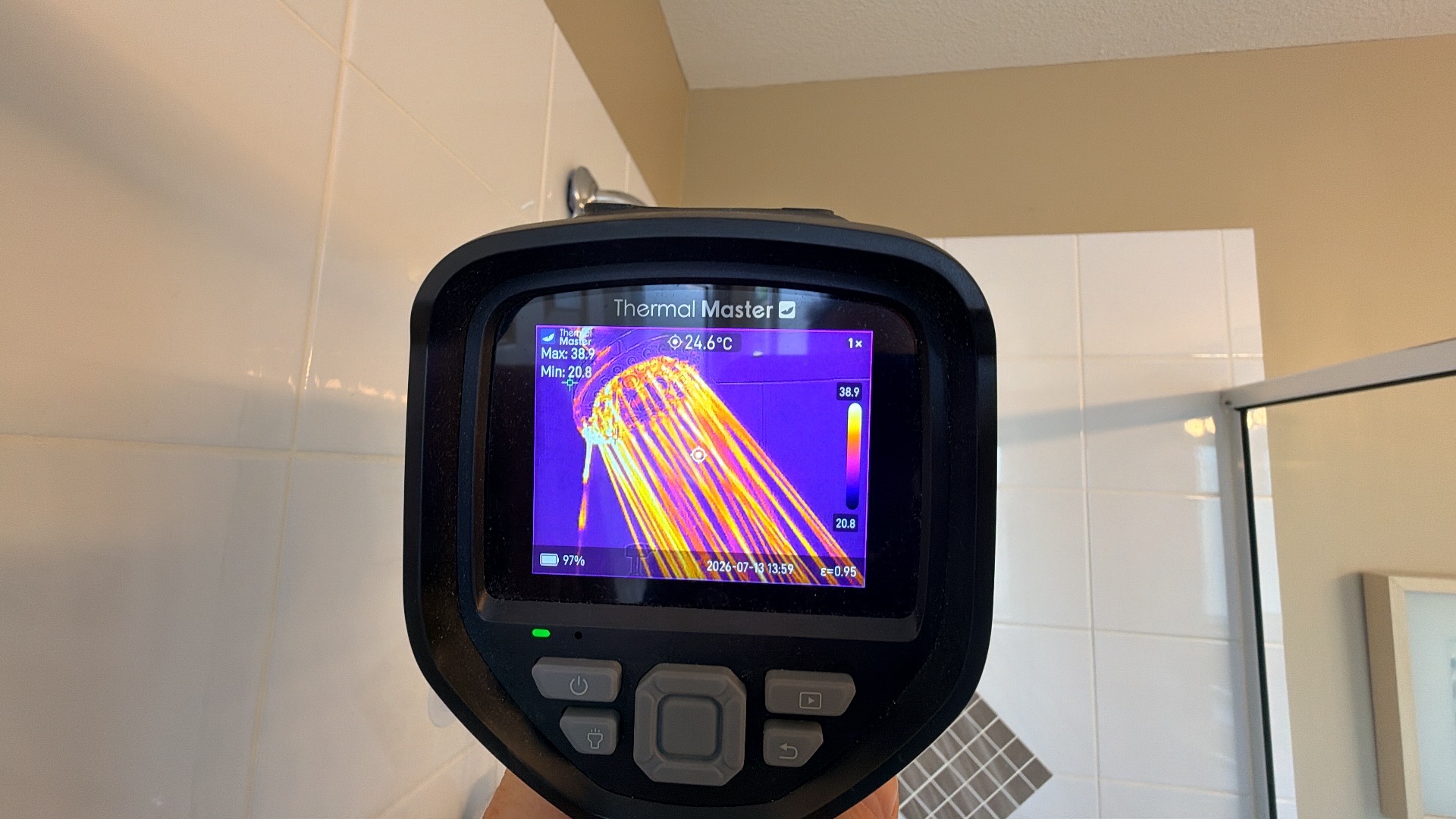 Thermal image revealing shower water intrusion