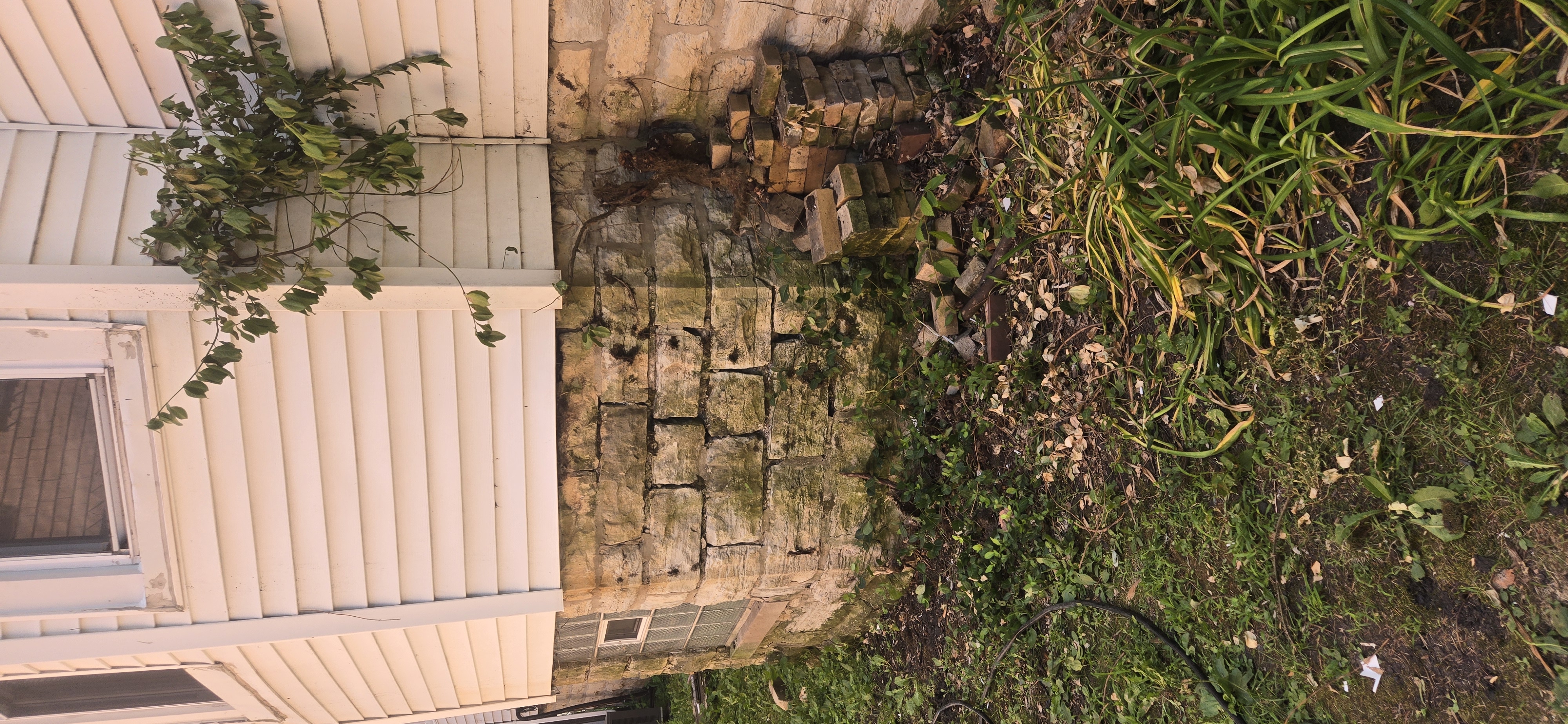 Before: Stone Foundation Tuckpointing