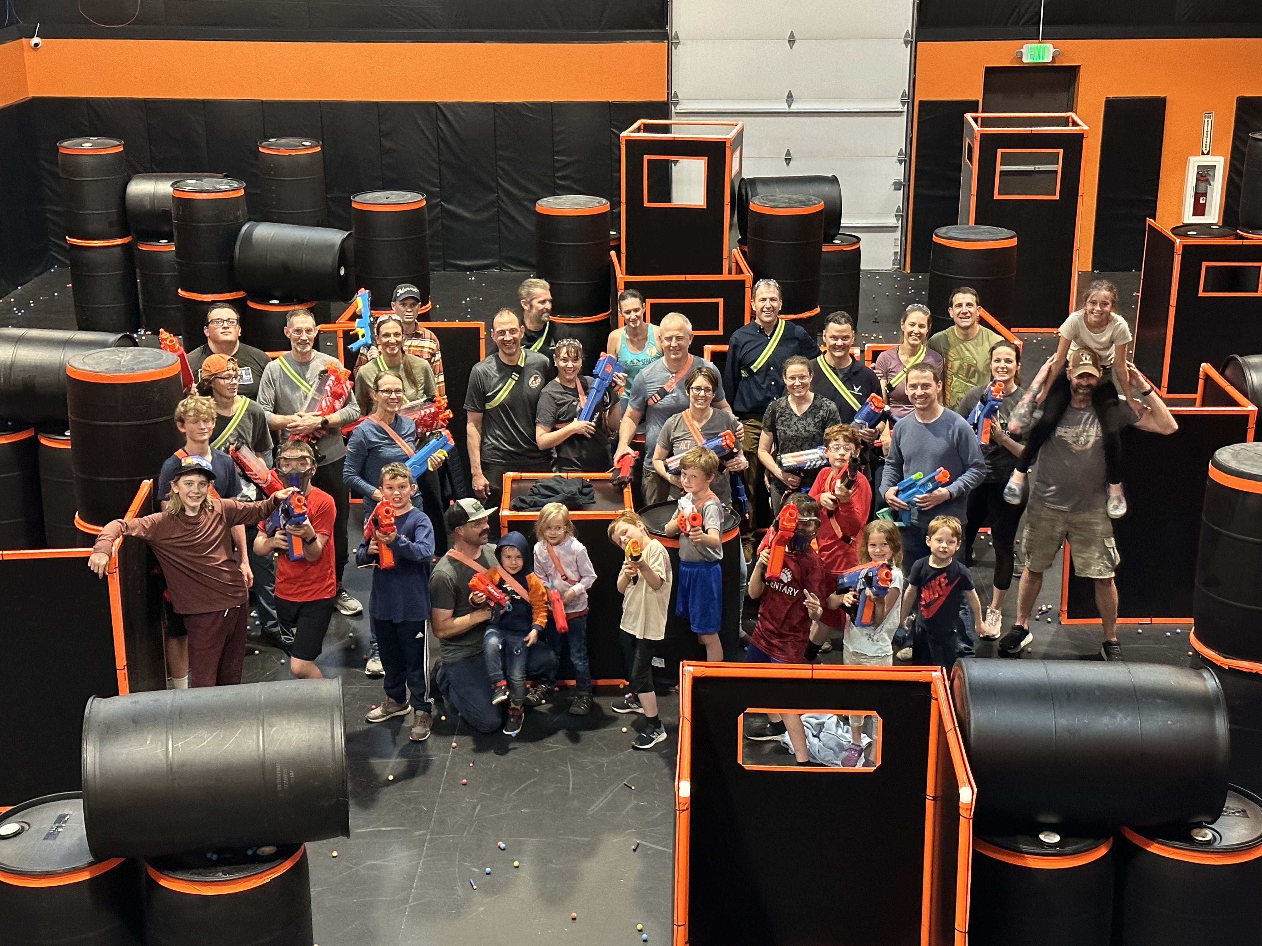 Foster family group at Dart Wars arena