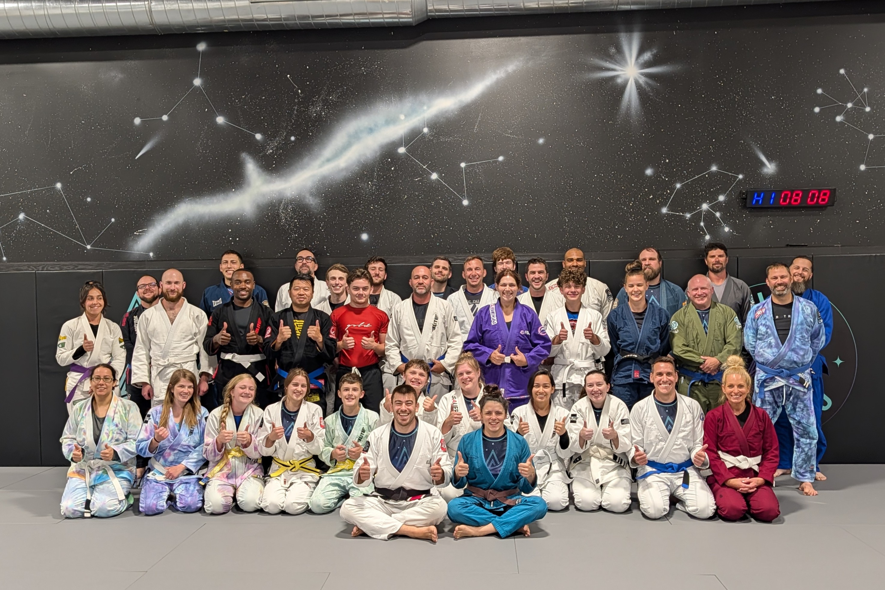 Aura Jiu Jitsu team — group photo on the mats in Mount Pleasant, WI