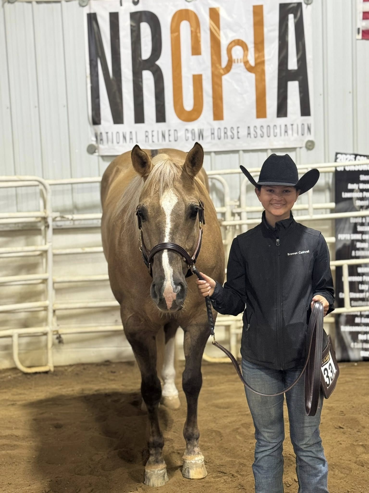 Student with NRCHA competition award