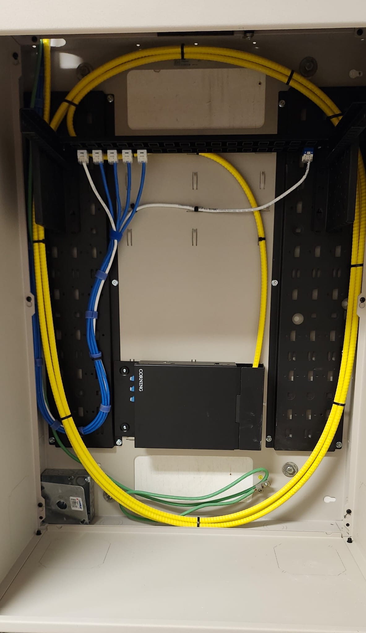Fiber optic termination and patch panel installation by KTS Solutions — organized fiber routing and clean cable management for high-speed networks