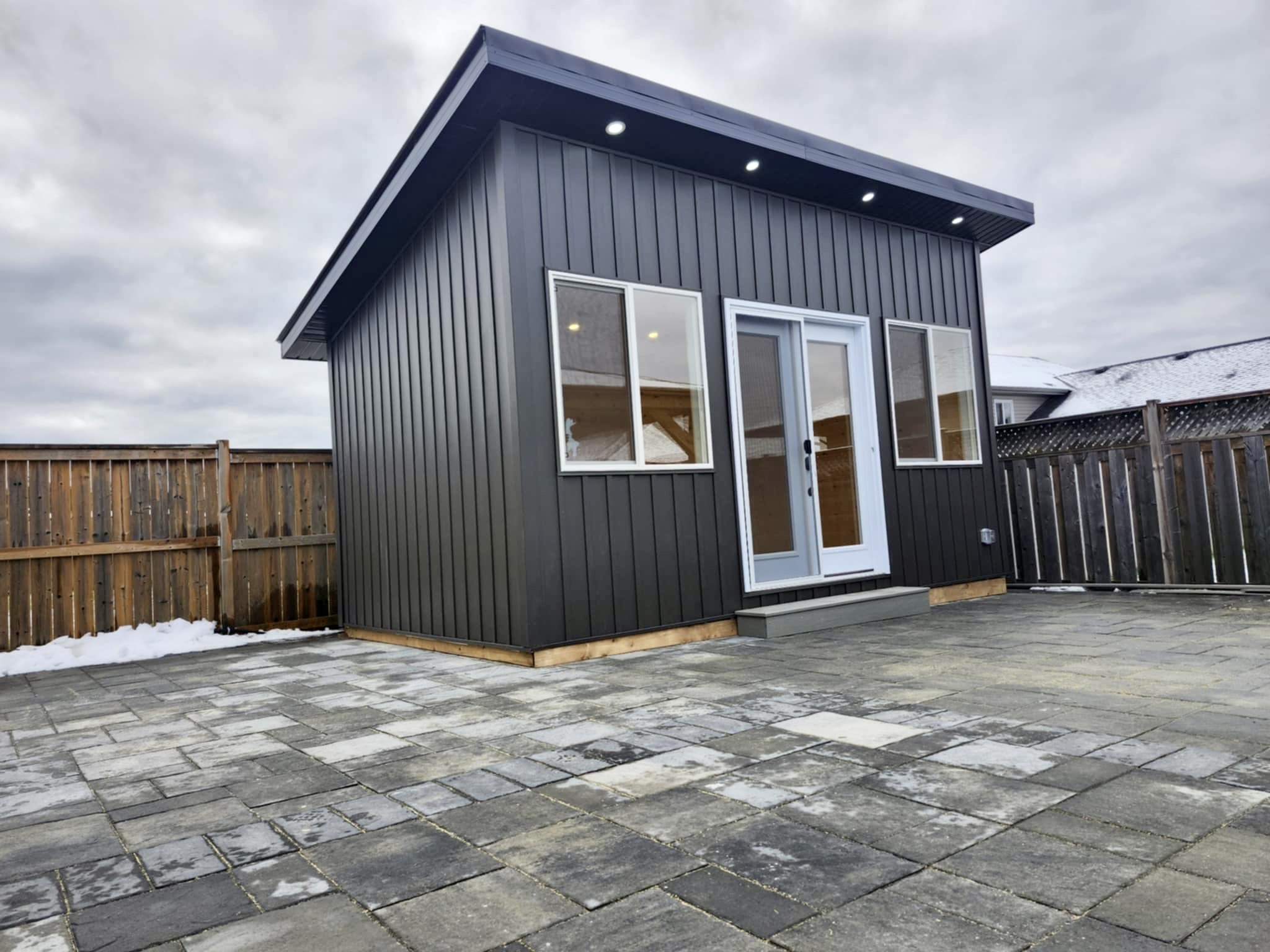 Custom shed with modern siding