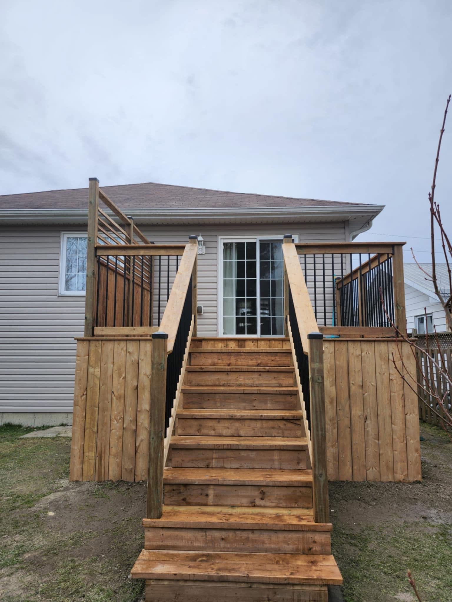 Custom deck with staircase front view