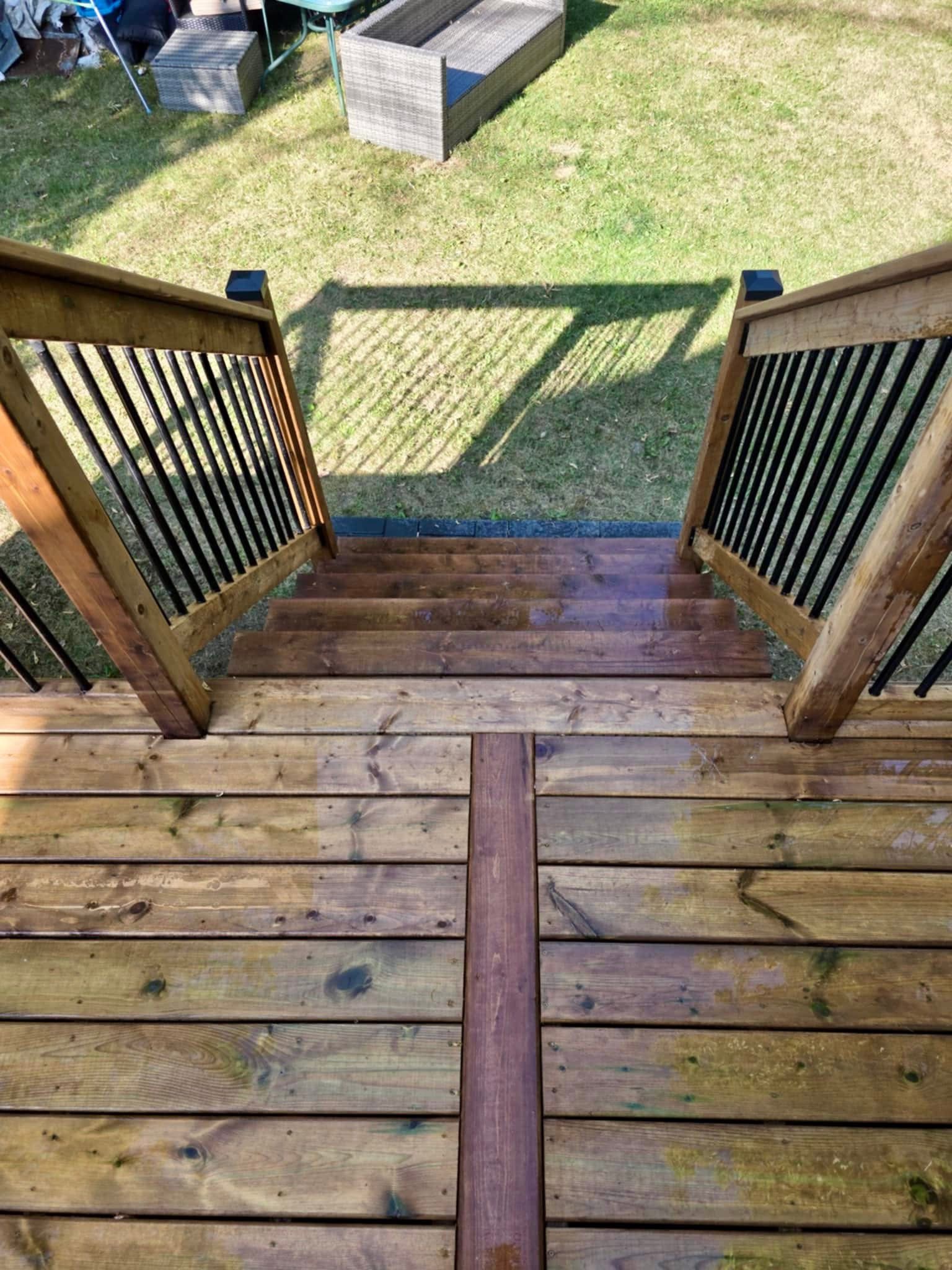 Deck stairs looking down to backyard