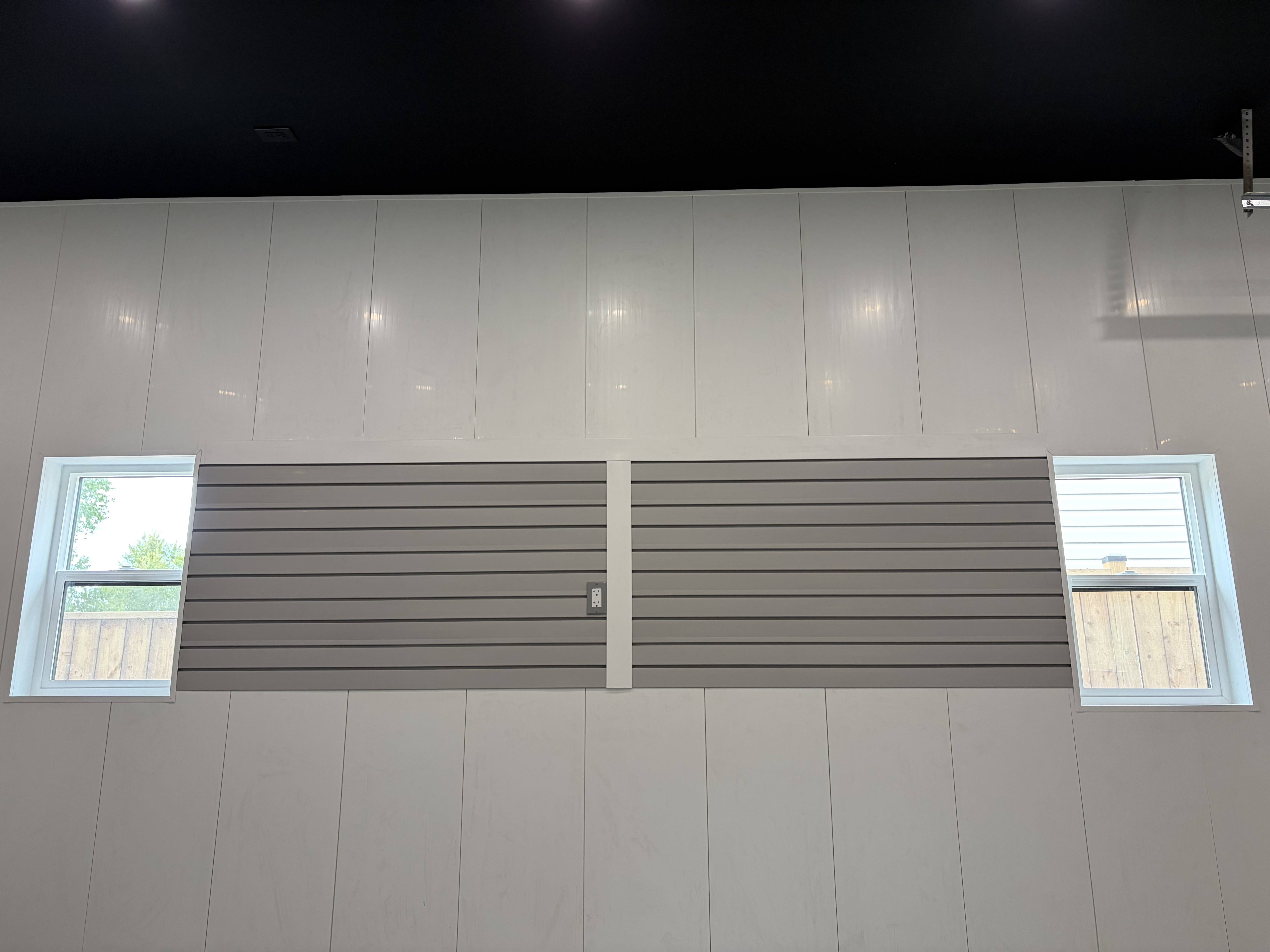 Garage interior slatwall storage with windows