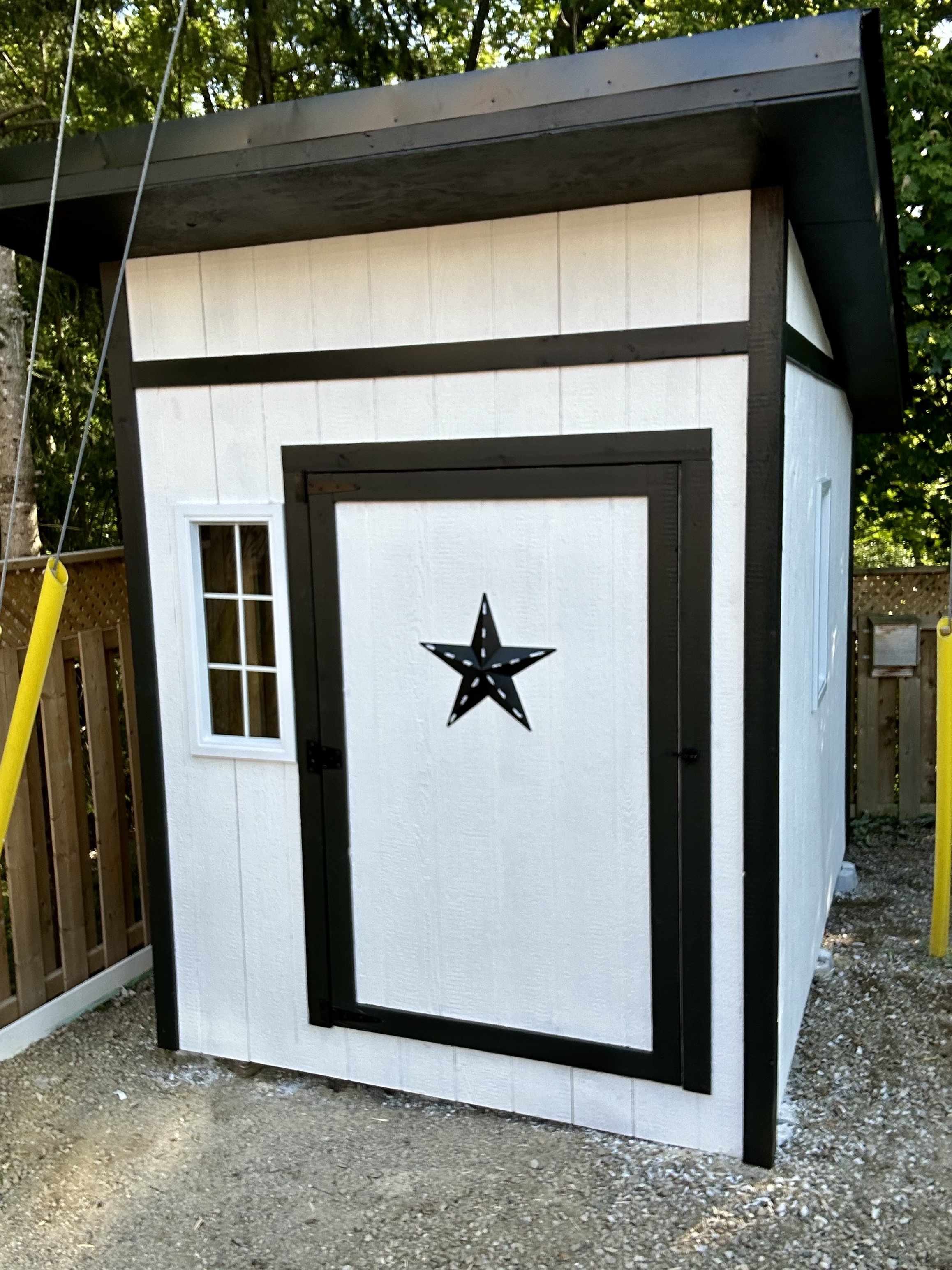 Custom painted shed with star detail