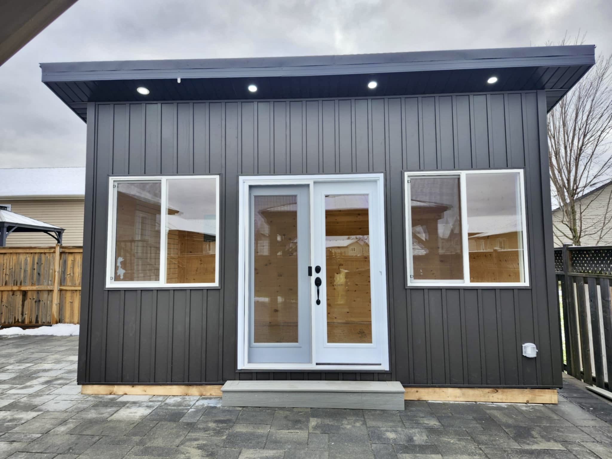 Custom shed front view with french doors