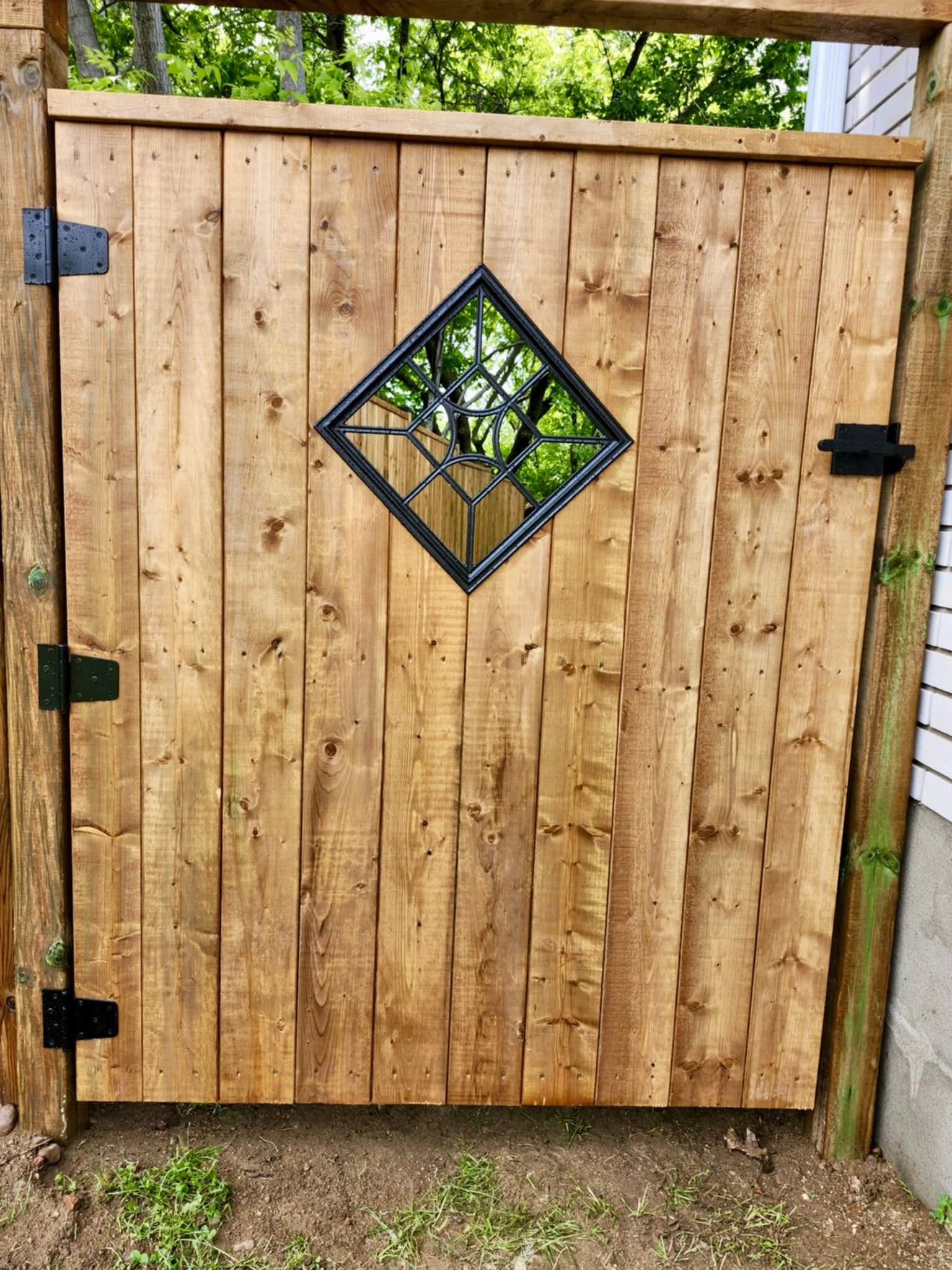 Custom fence gate with decorative diamond window