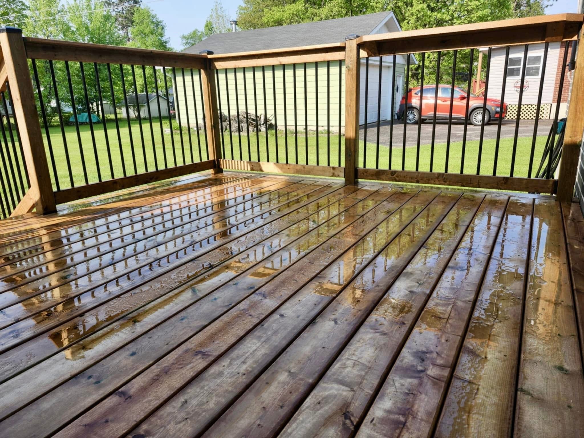 Freshly stained deck with railing detail