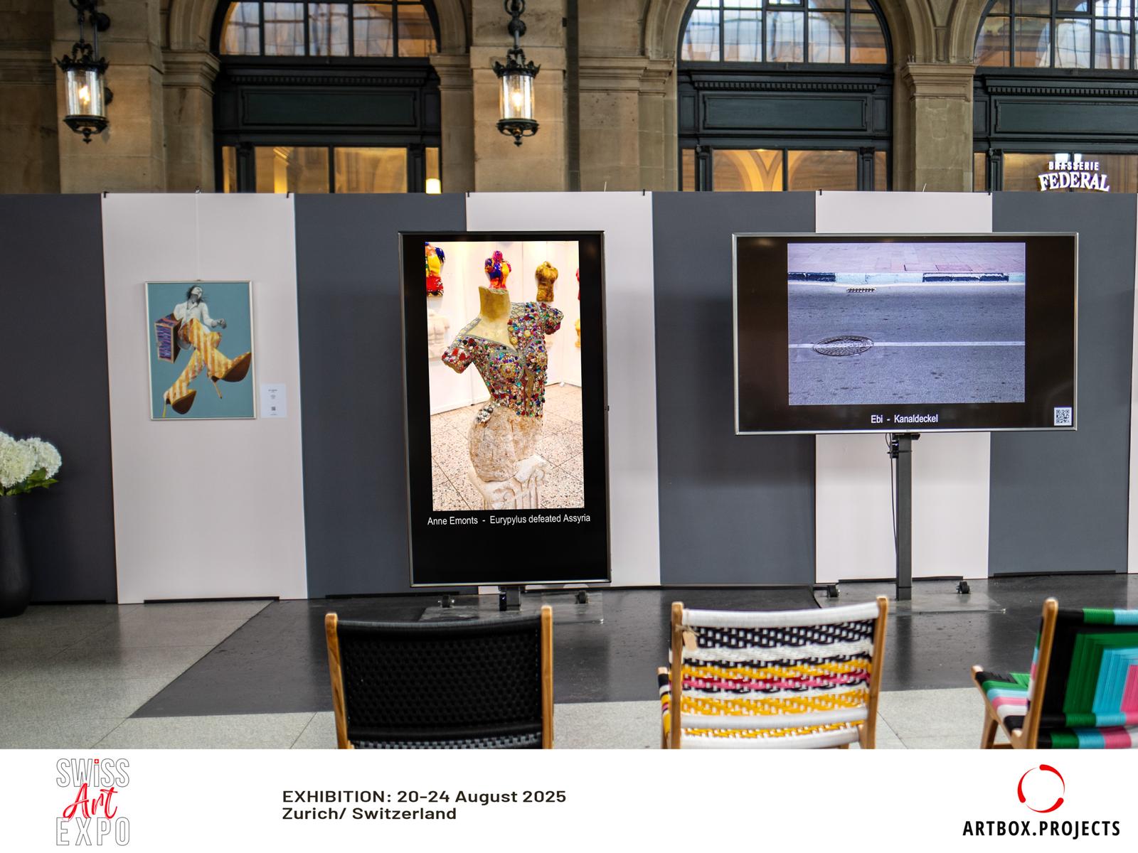 Anne's 'Eurypylus defeated Assyria' displayed on digital screen at Swiss Art Expo Zürich 2025