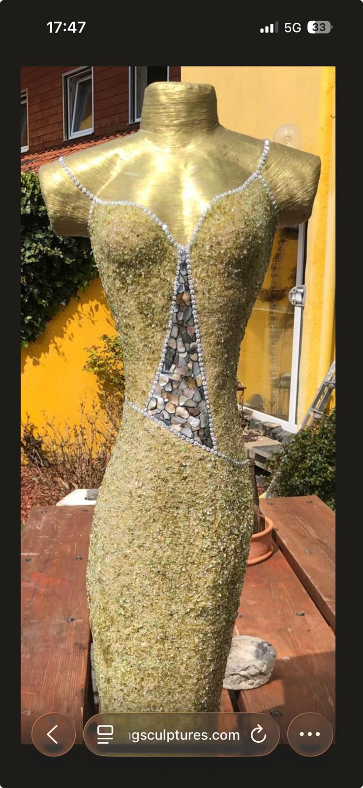 Full-length golden glittering body sculpture with crystal straps and stone inlay