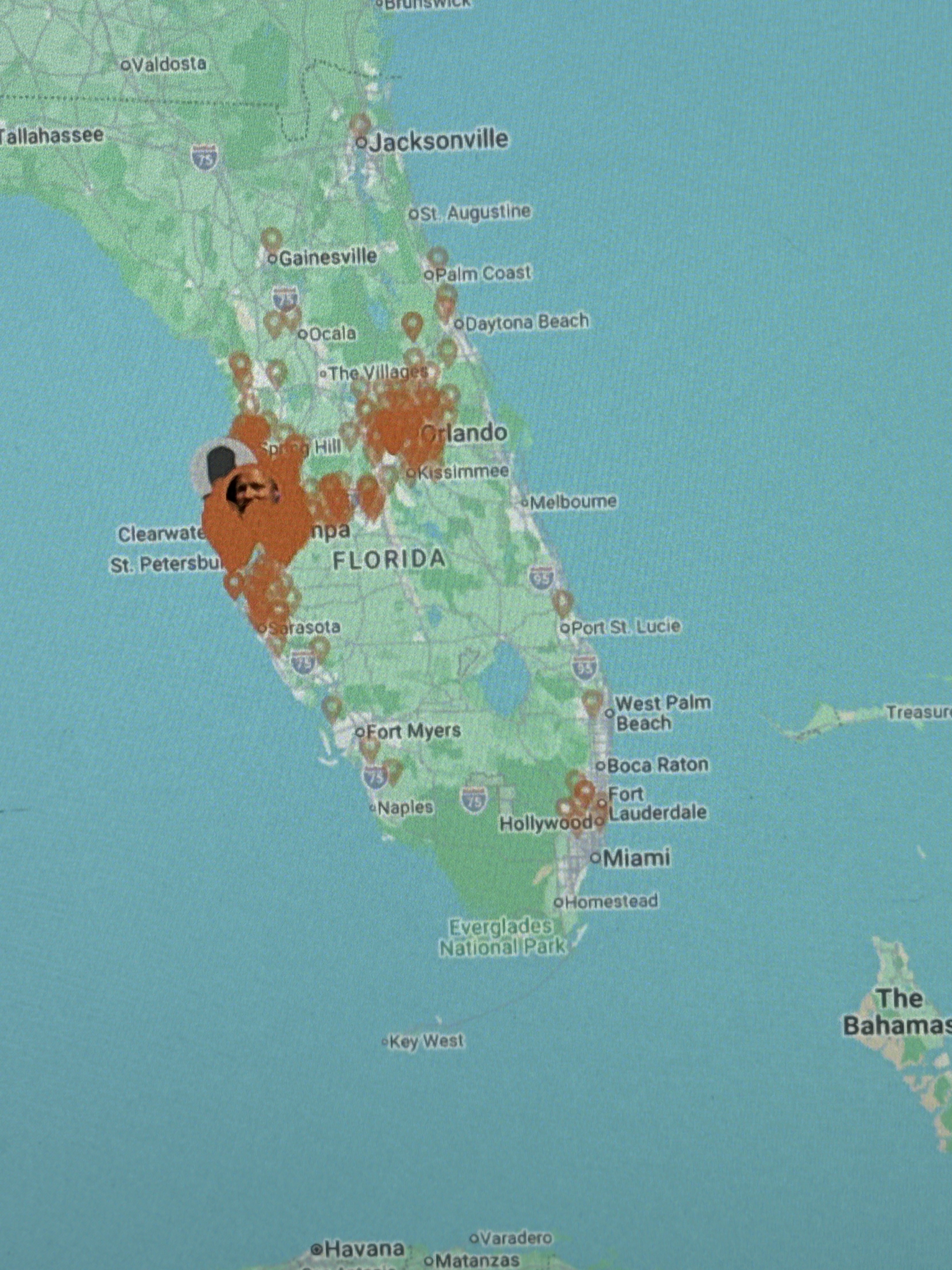 Map of Florida showing LED Artistry's 1,000+ client locations as orange pins — dense coverage in Tampa Bay and Central Florida, with installations statewide from Jacksonville to Miami
