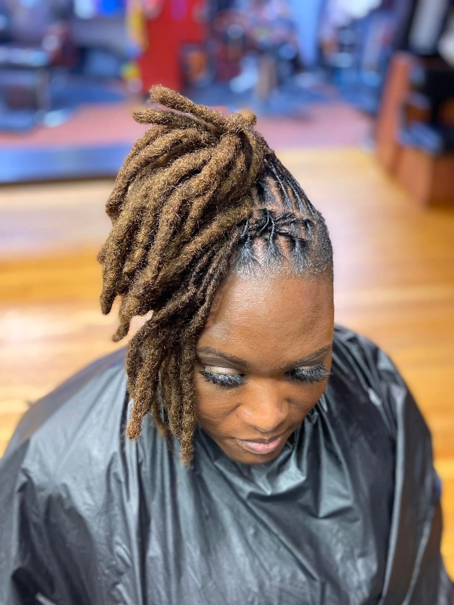 Styled locs with updo and clean parting by Head Loctician Loc'd In Wit Lexx at Pure Masters Lounge Rochester NY Styled locs with updo and clean parting by Head Loctician Loc'd In Wit Lexx at Pure Masters Lounge Rochester NY
