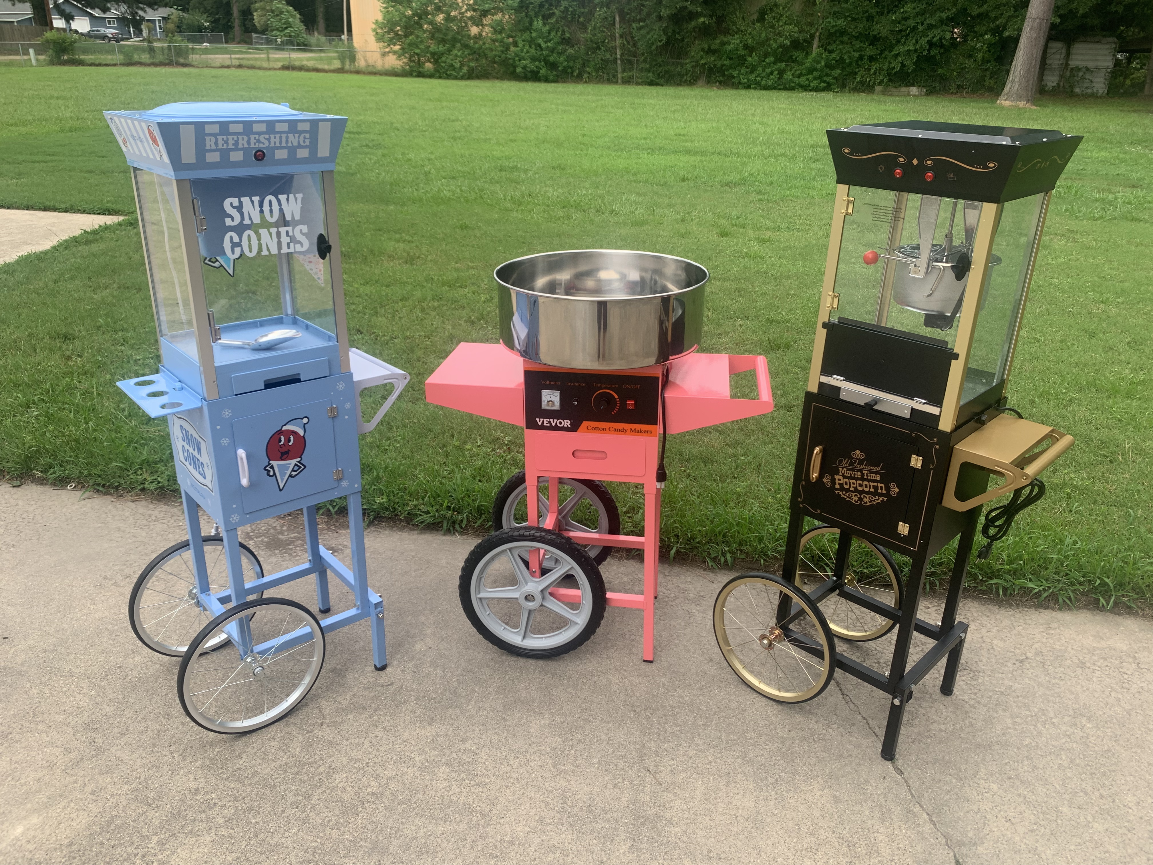 Concession machines — snow cone, cotton candy, and popcorn carts