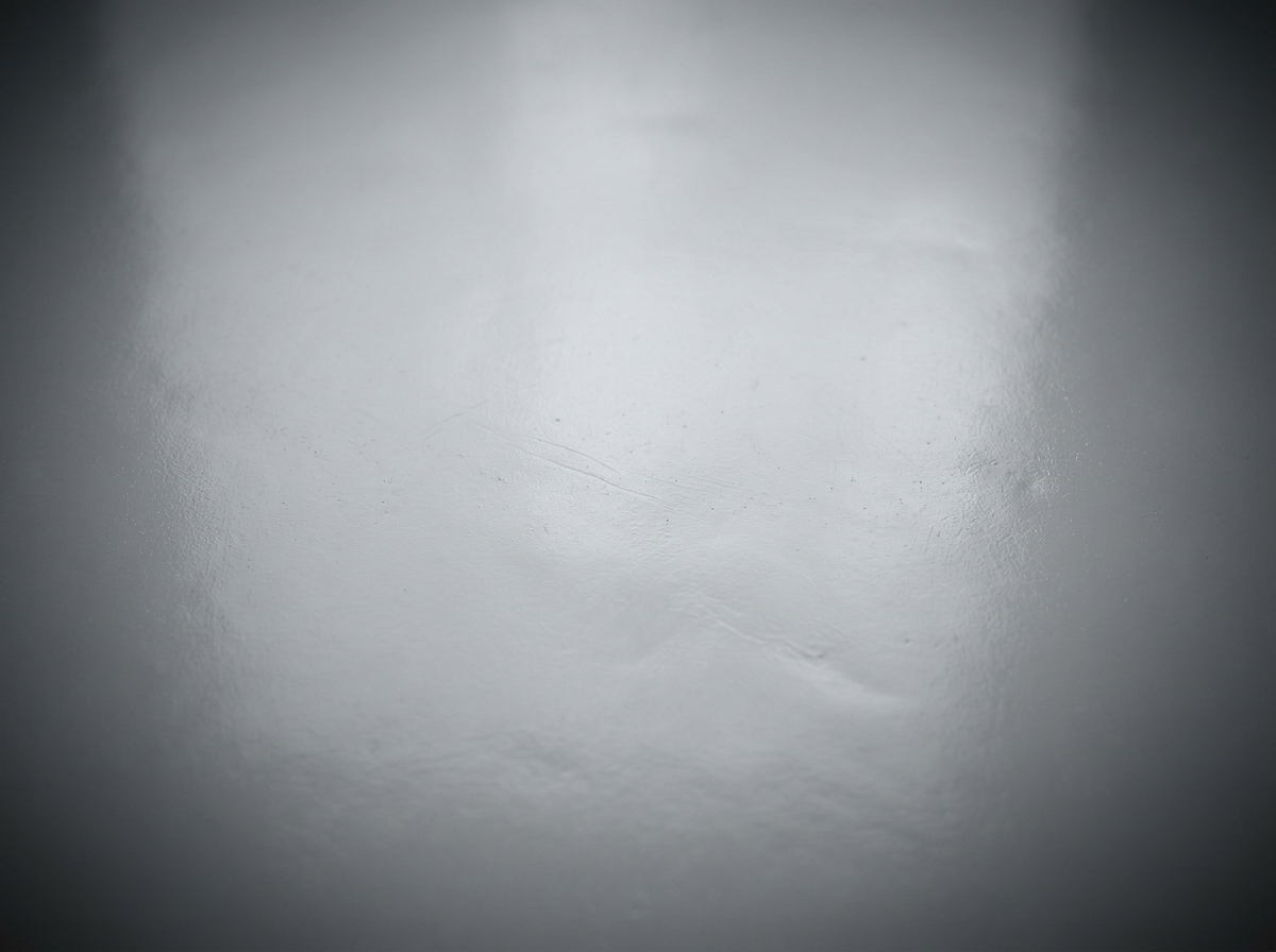 Close-up of a seamless polyurea membrane — smooth, monolithic, no seams