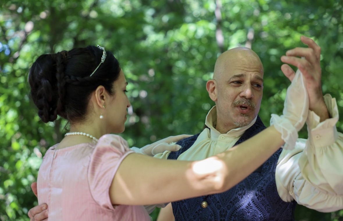 Xavier Marzan and Caterine Sanchez dancing in Regency attire — Bridgerton in the Park, Central Park, June 7, 2026