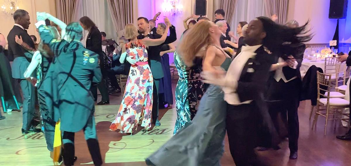 The Waltz Series β couples dancing in formal evening attire in a grand ballroom, women in flowing gowns and men in tuxedos, chandeliers and purple lighting, dynamic movement captured mid-dance