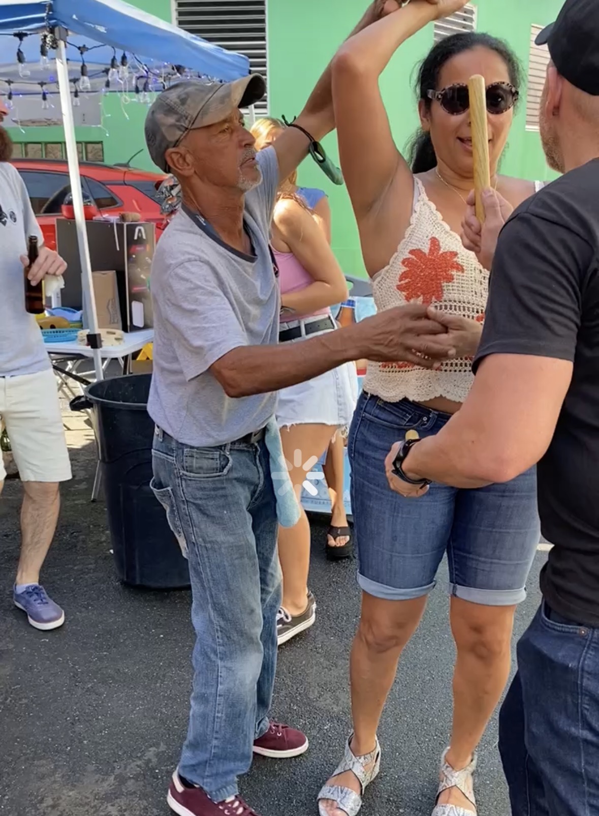 Street dancing in Puerto Rico — locals dancing together outdoors with music and energy