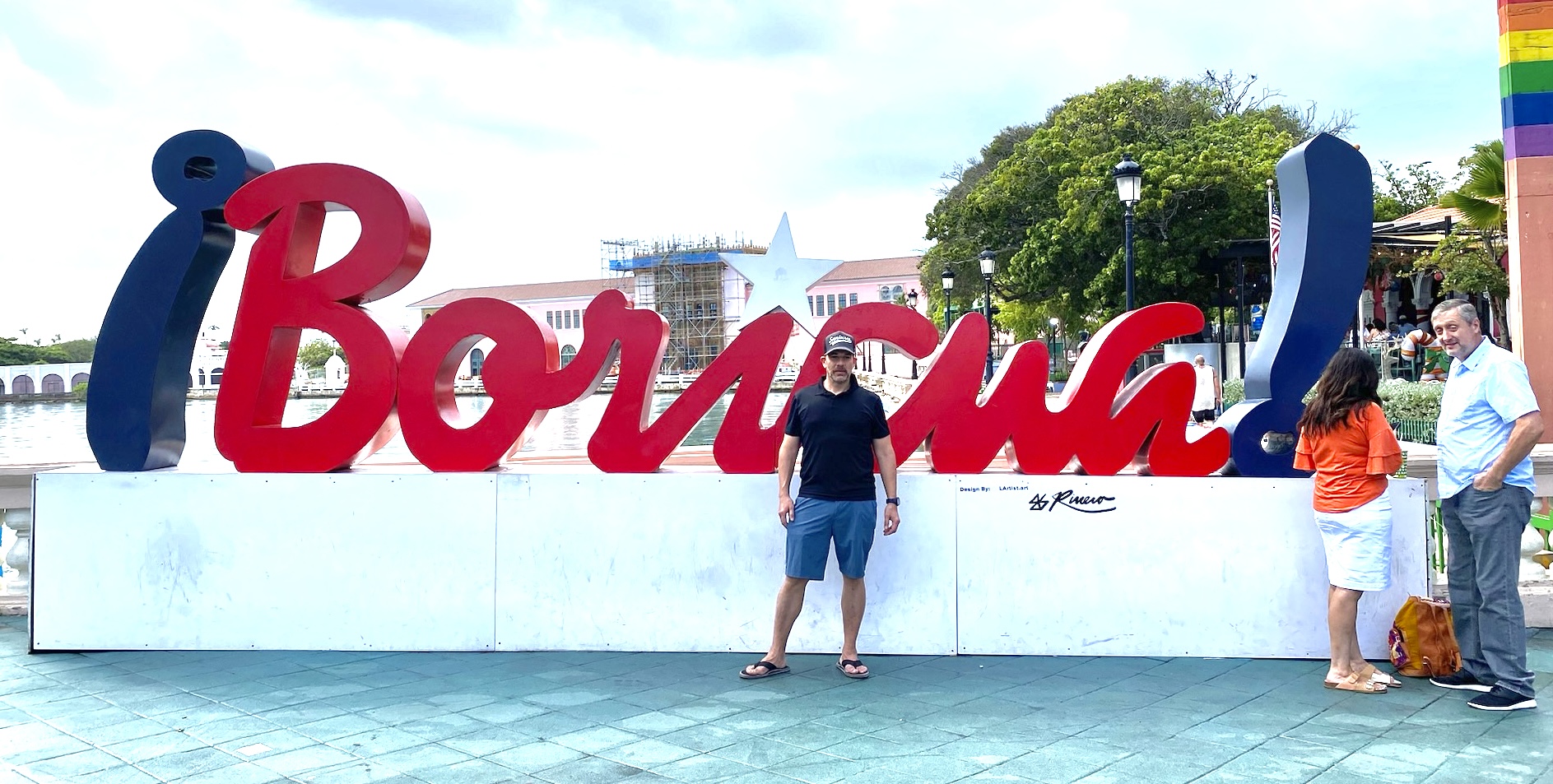 Xavier standing in front of the ¡Boricua! sign in Old San Juan, Puerto Rico