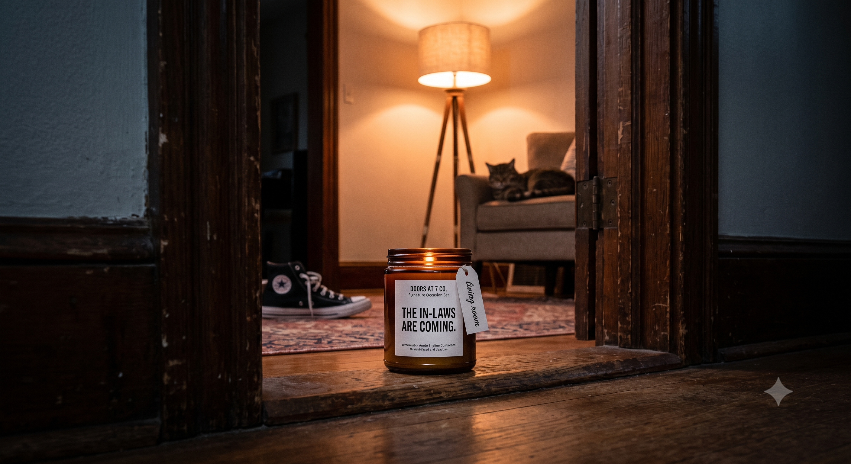 Doors at 7 Co. candle sitting in a doorway between rooms with warm ambient lighting