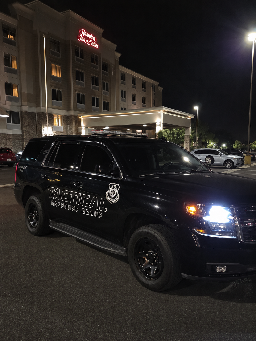 Tactical Response Group patrol vehicle at hotel security post
