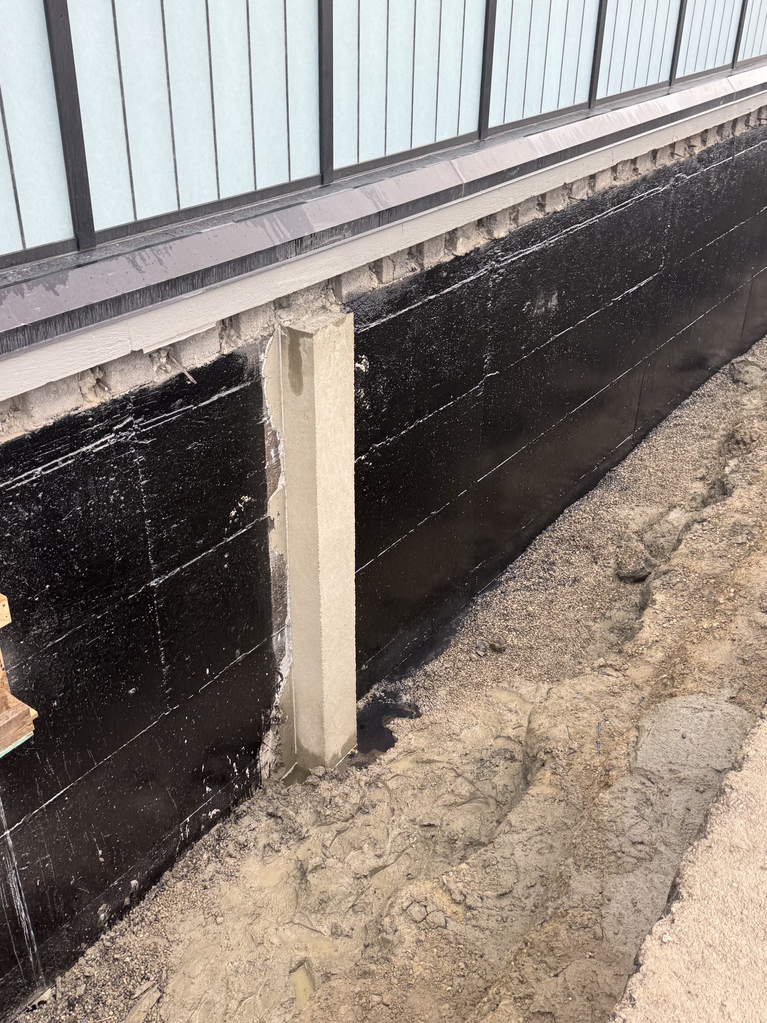 Coated Wall with Completed Vertical Crack Repair