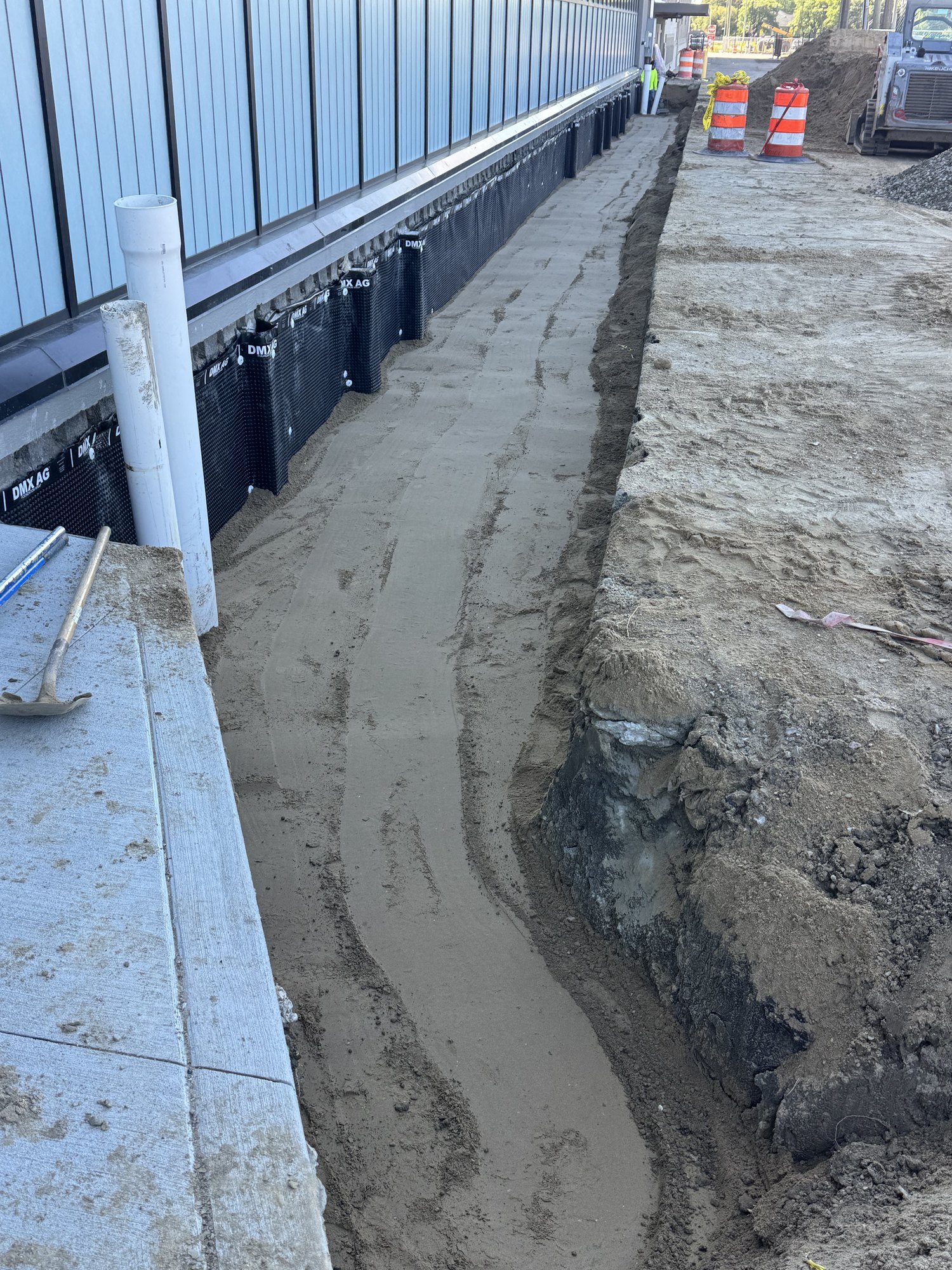 Trench Prepared for Backfill — Risers in Place