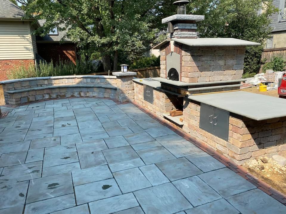 Stamped Concrete Patio with Pizza Oven — Day View