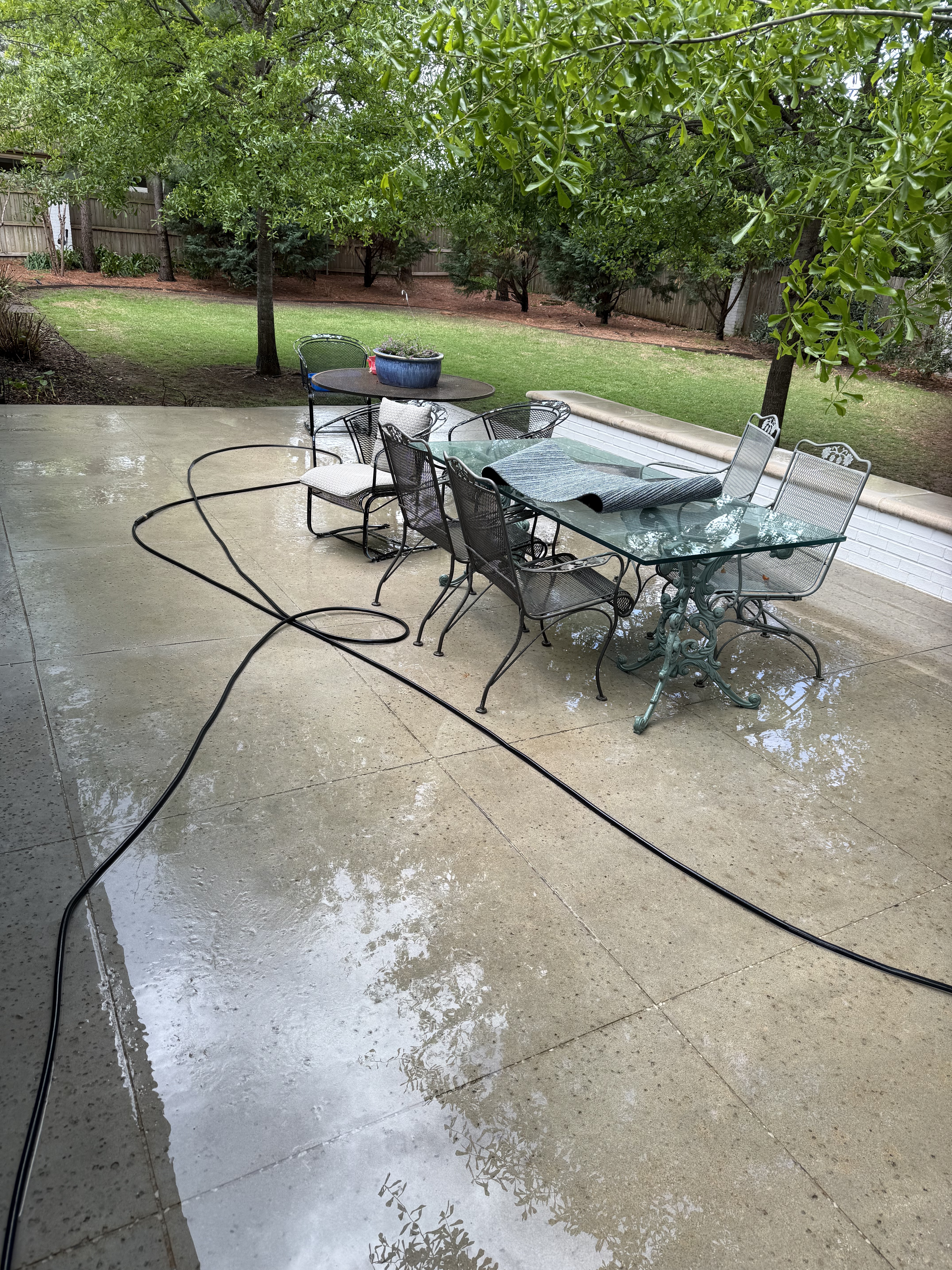 Freshly pressure washed patio and outdoor furniture