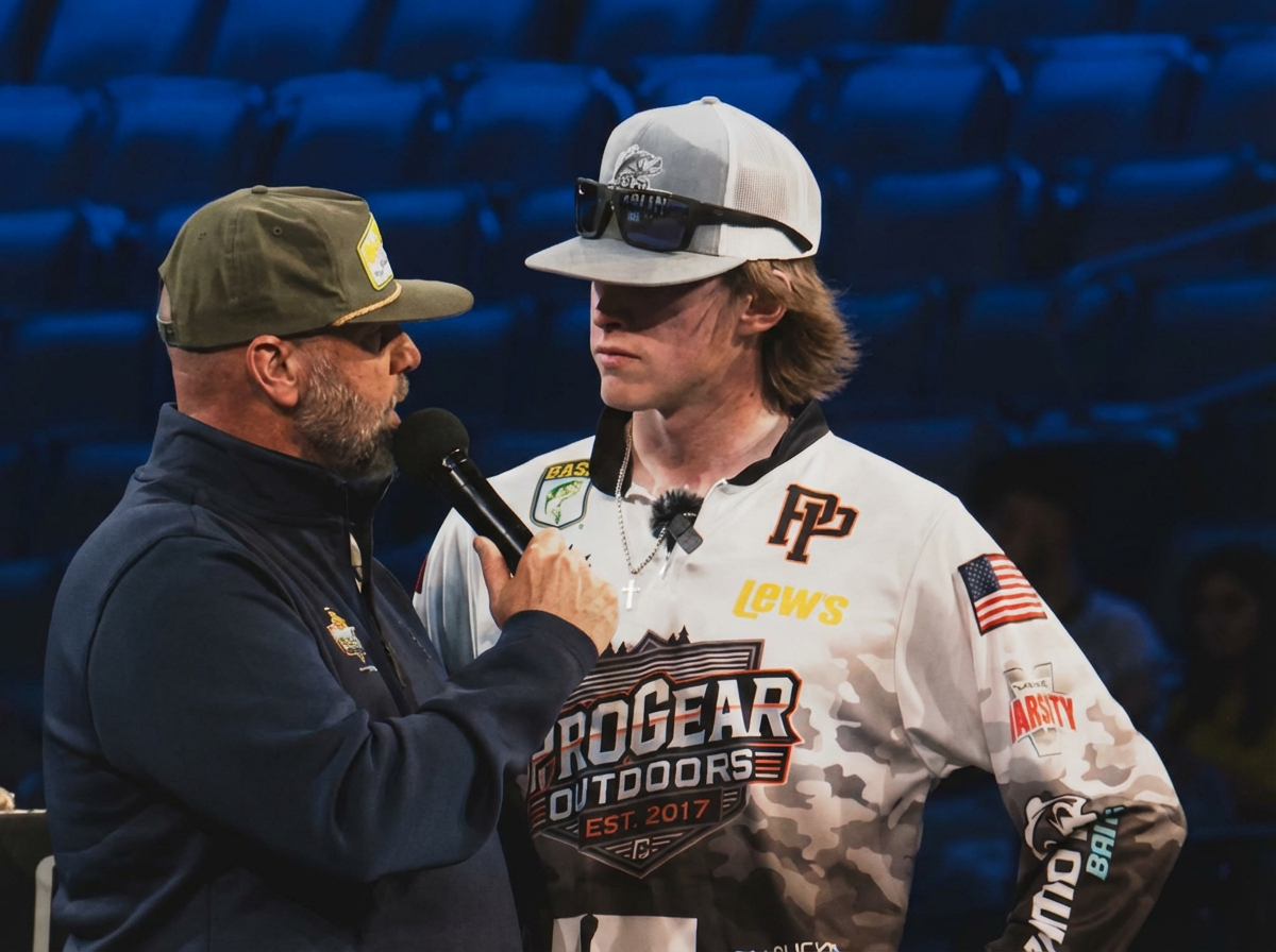 Aiden being interviewed with microphone