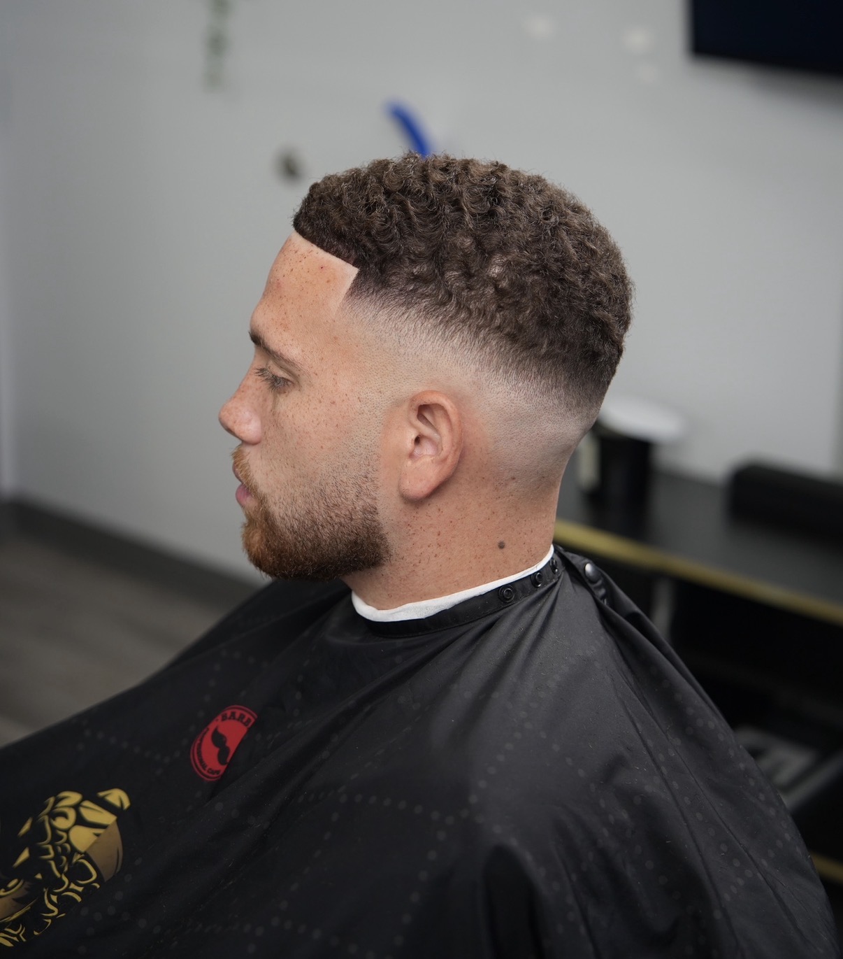 Curly top with skin fade