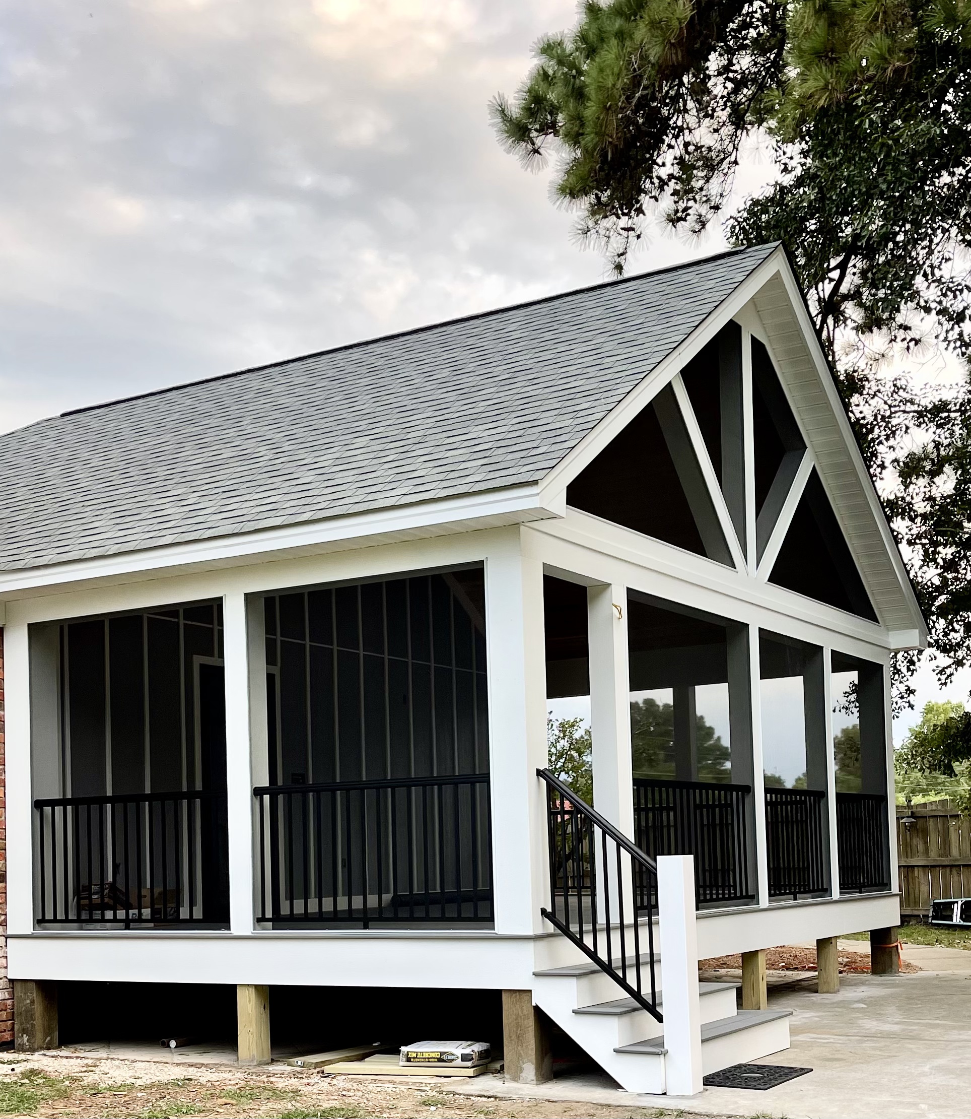 Custom screened porch built by MH Trim