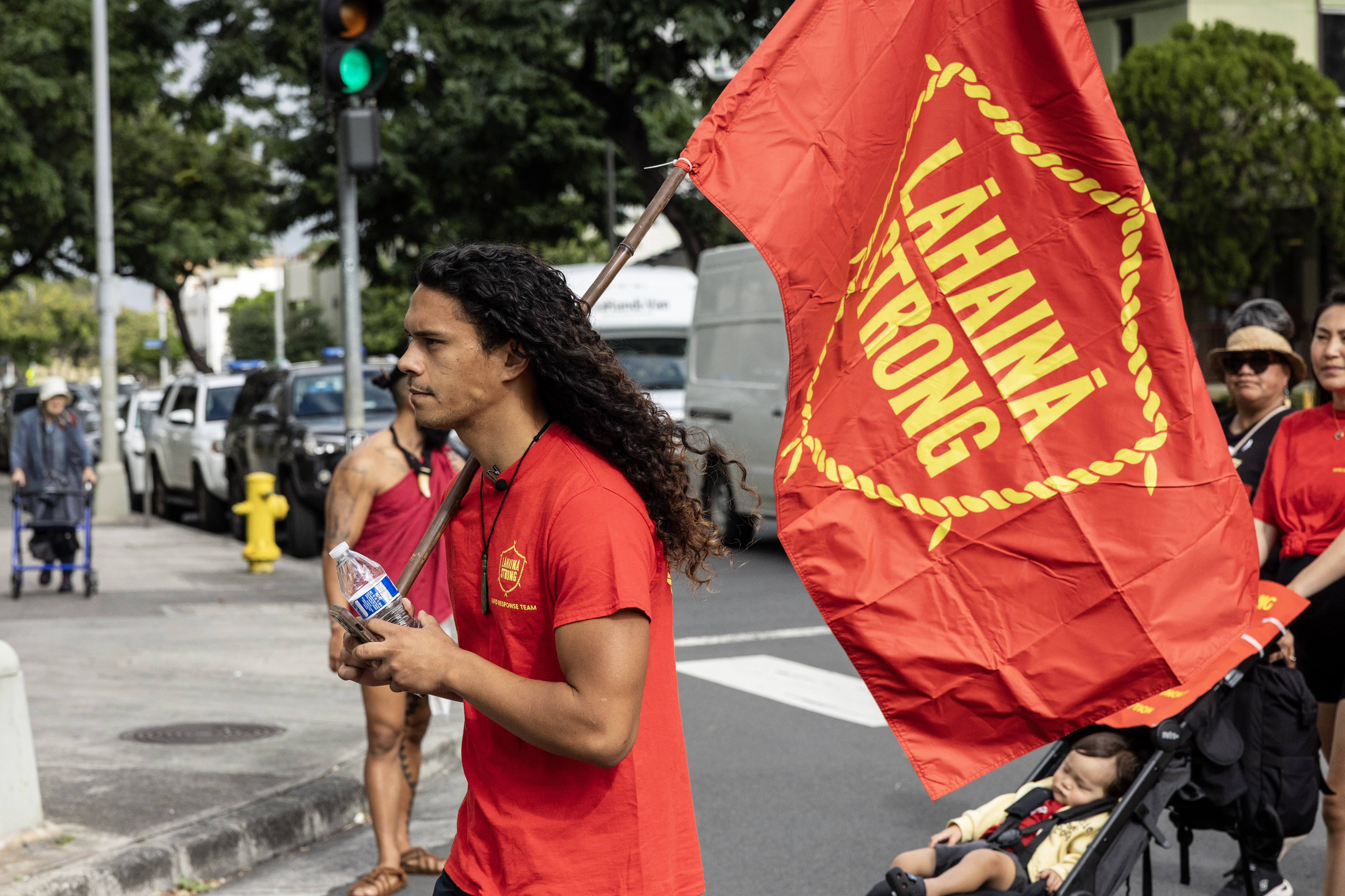 Lahaina Strong community in red shirts