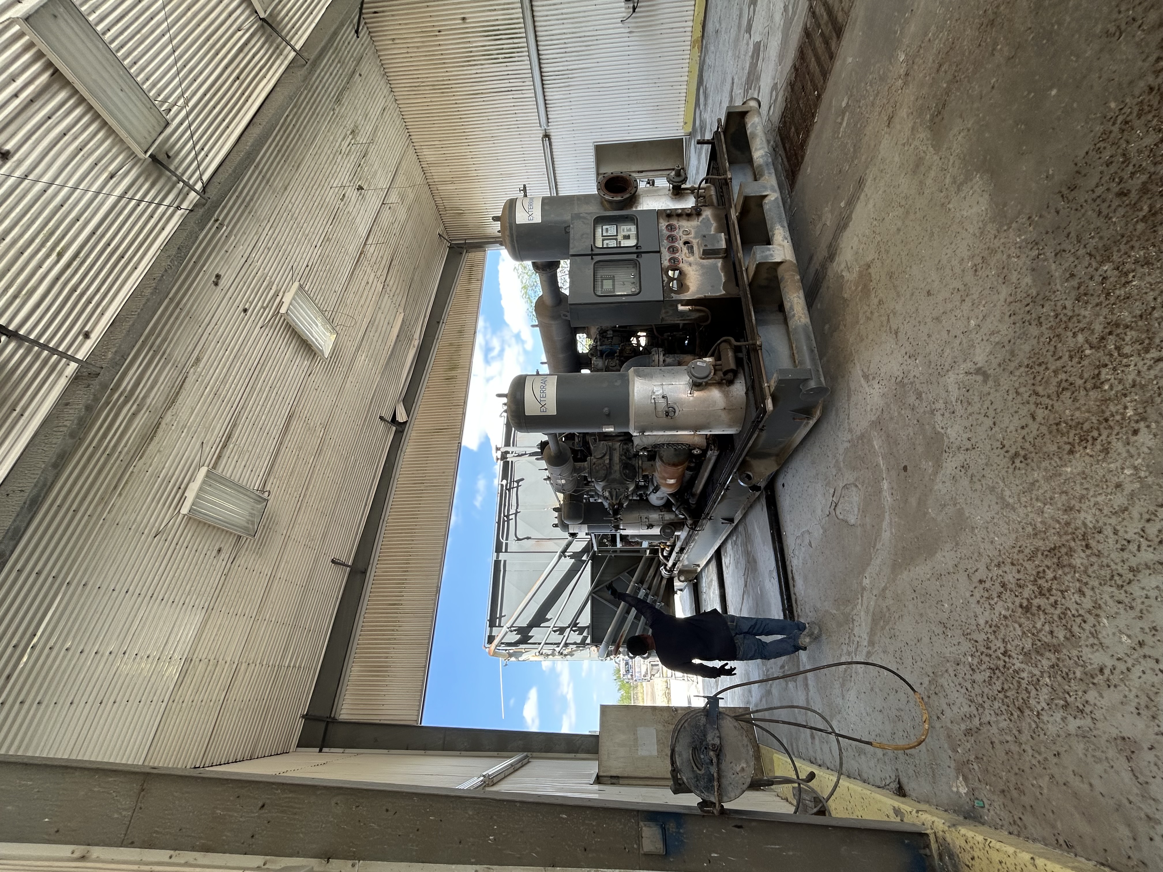Package #5 before: CAT 3516 compressor in shop bay