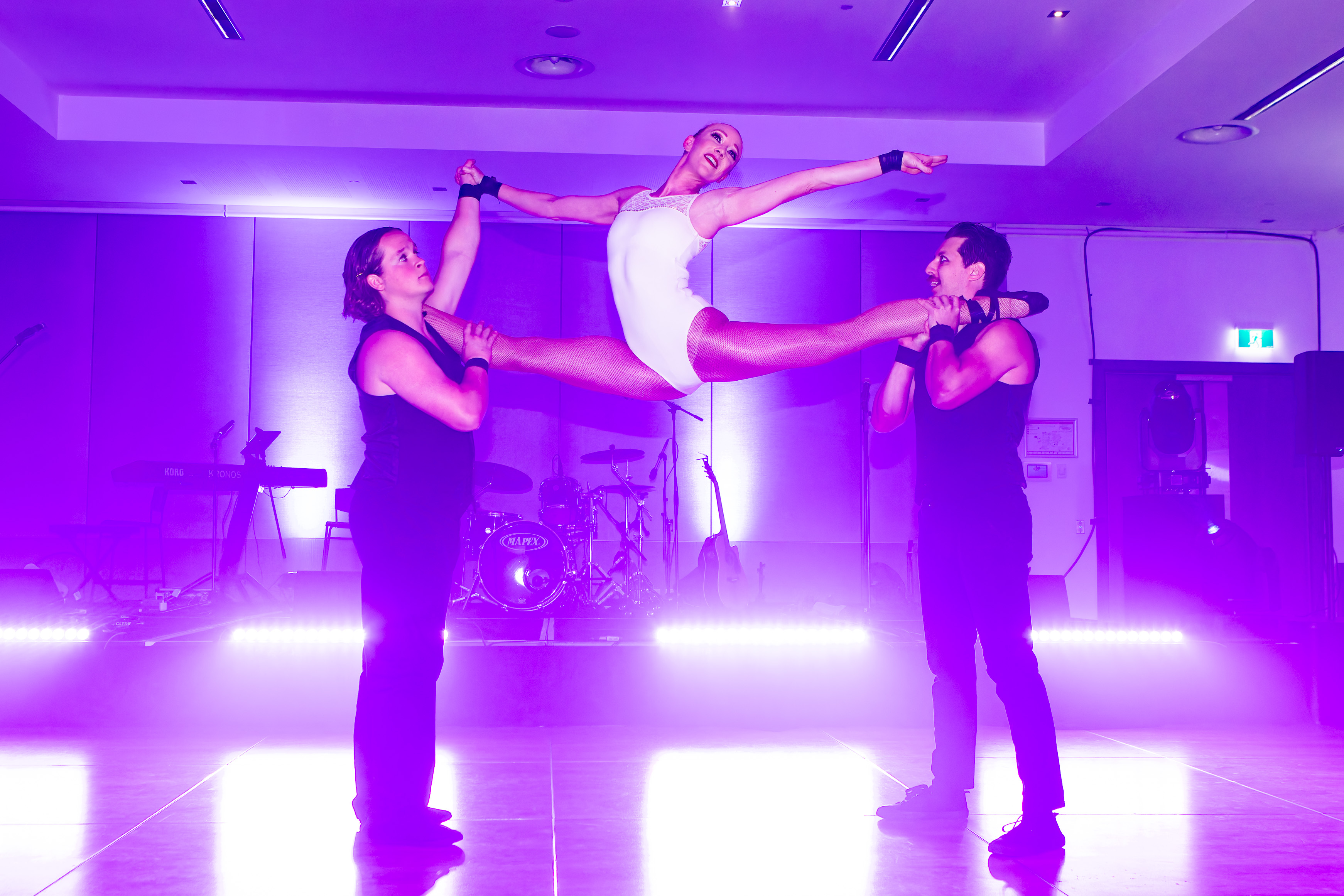 Acrobatic performers on stage at the Grey Matter Gala 2025