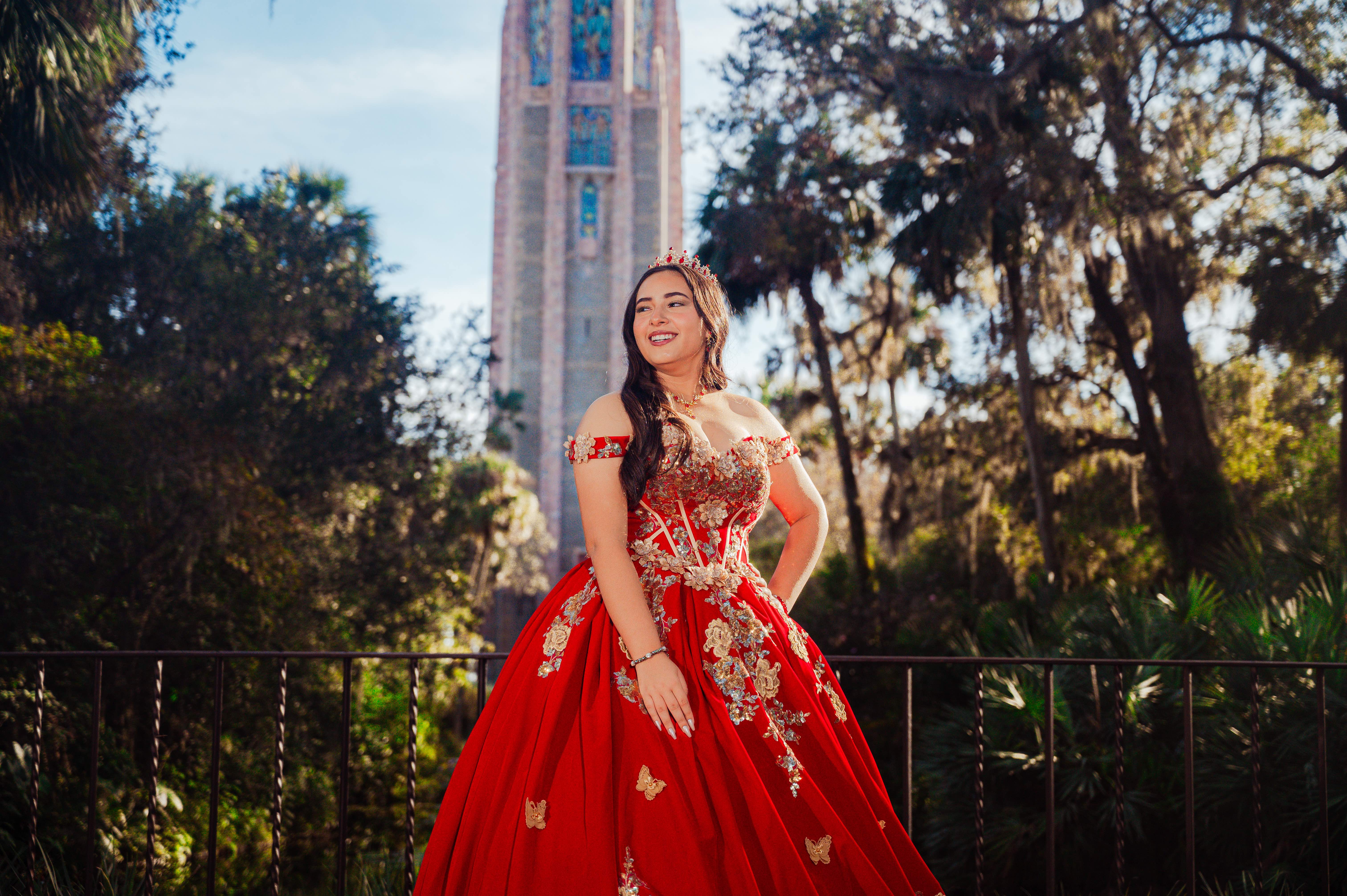 Quinceañera portrait in red dress at Bok Tower