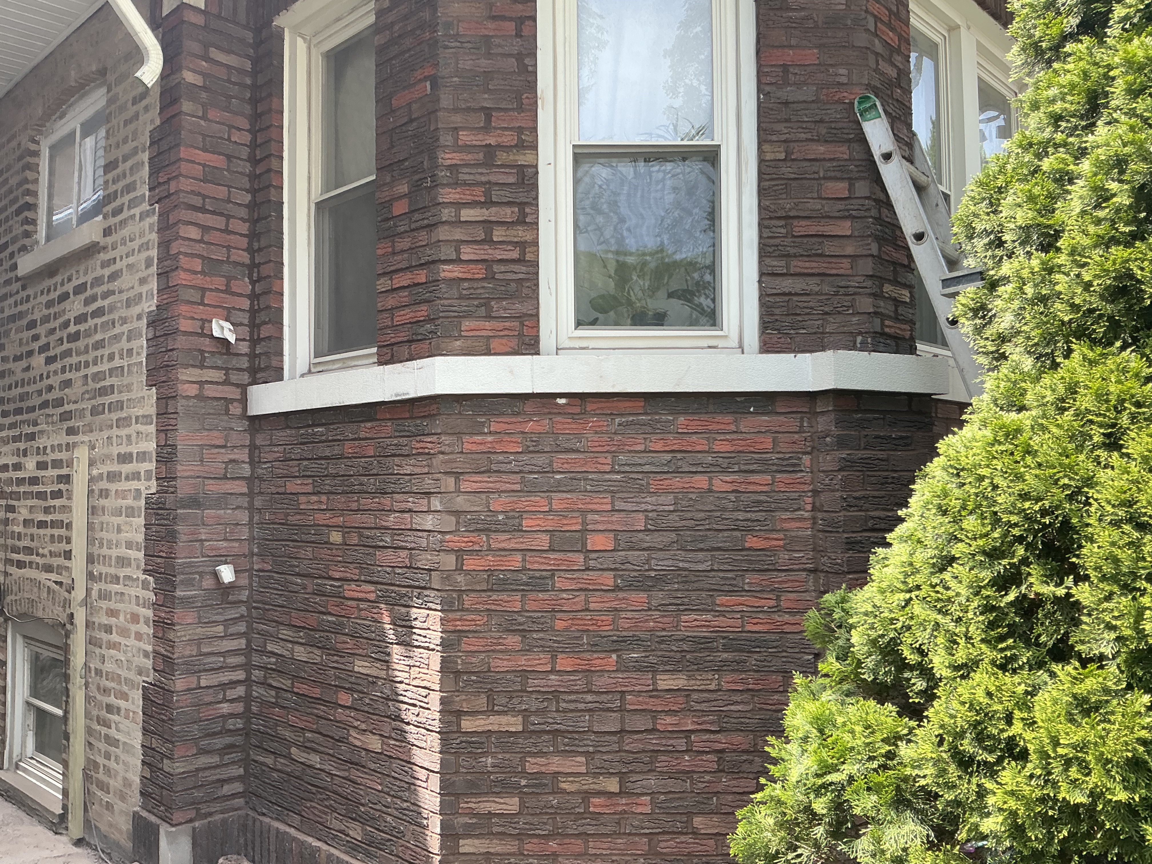 Residential Bay Window — Tuck-Pointing