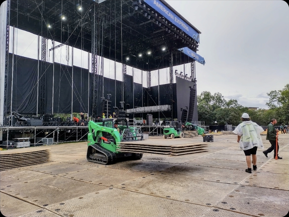 American Express stage — skid steers and deck work