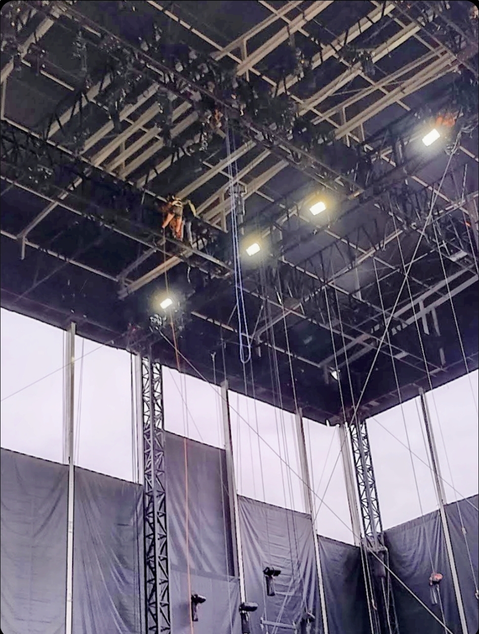 Rigger in the truss — high steel work