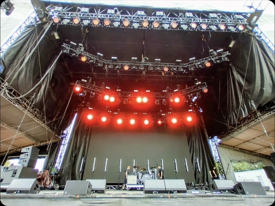 Backstage — full lighting rig glowing red