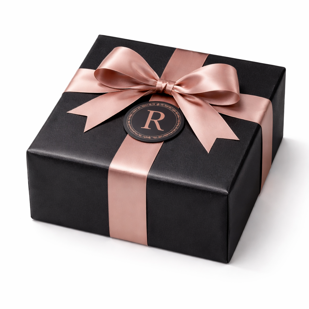 Luxury gift box with rose gold ribbon and R monogram