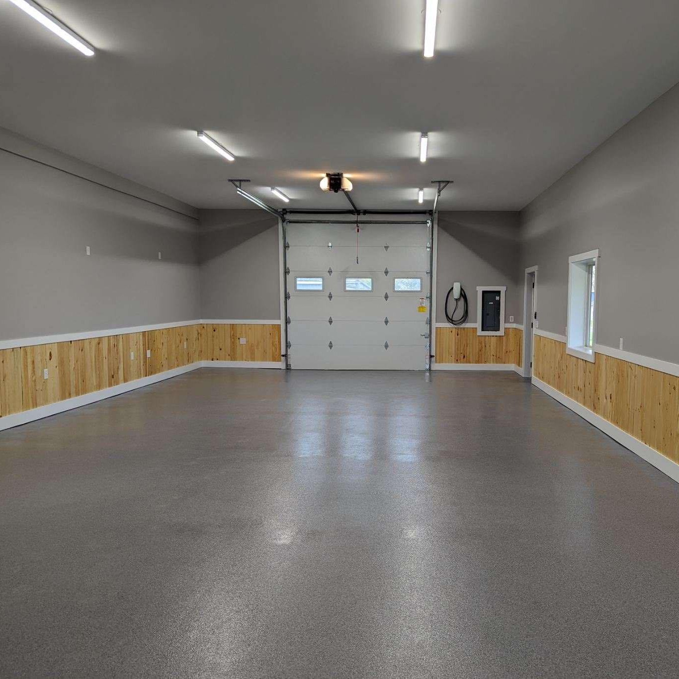 Garage LED shop lighting EV charger and subpanel installation by Premier Electric Rochester NY
