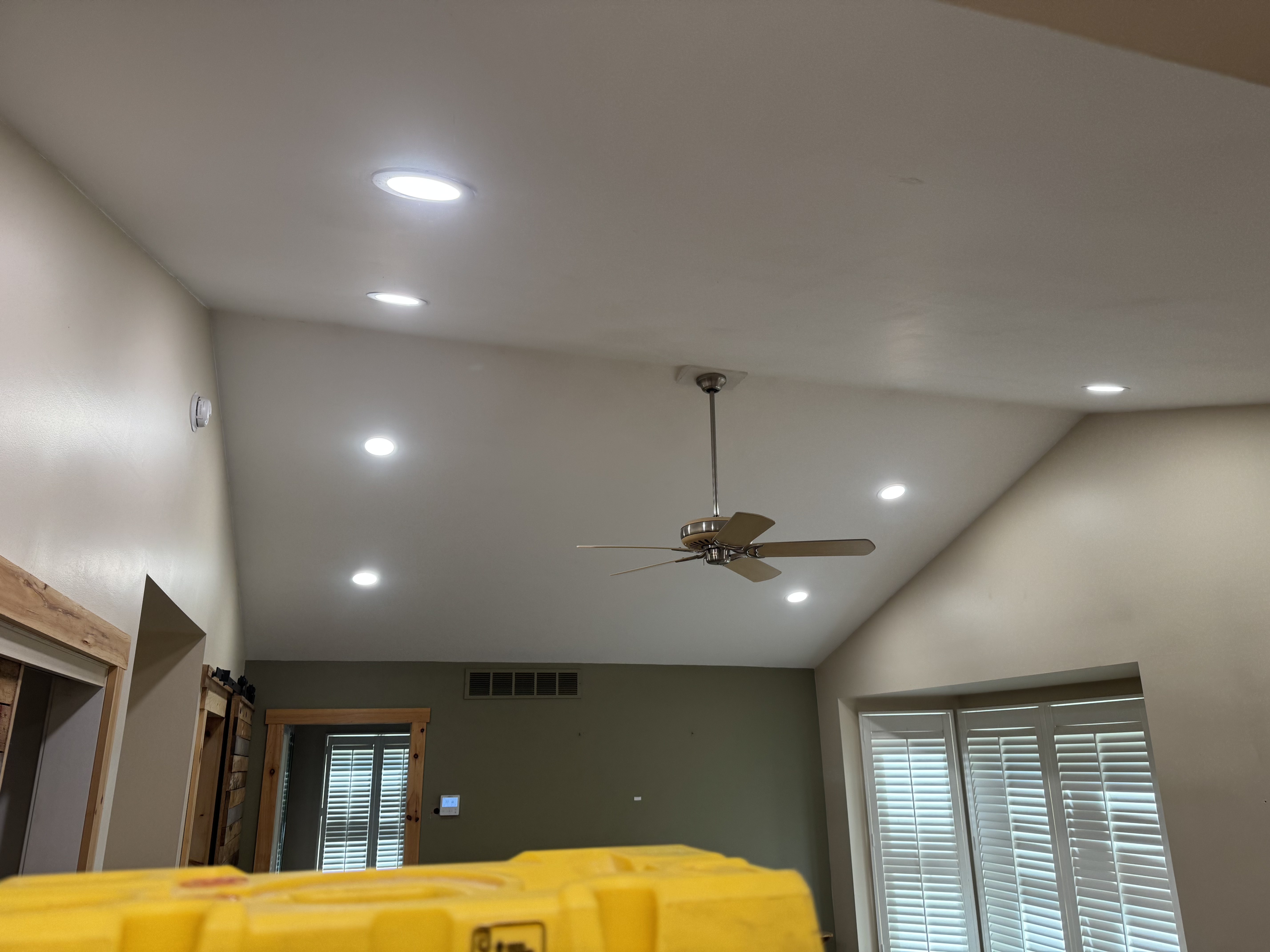 Vaulted ceiling recessed LED lighting and ceiling fan installation in residential home by Premier Alarms and Electric โ Monroe County NY