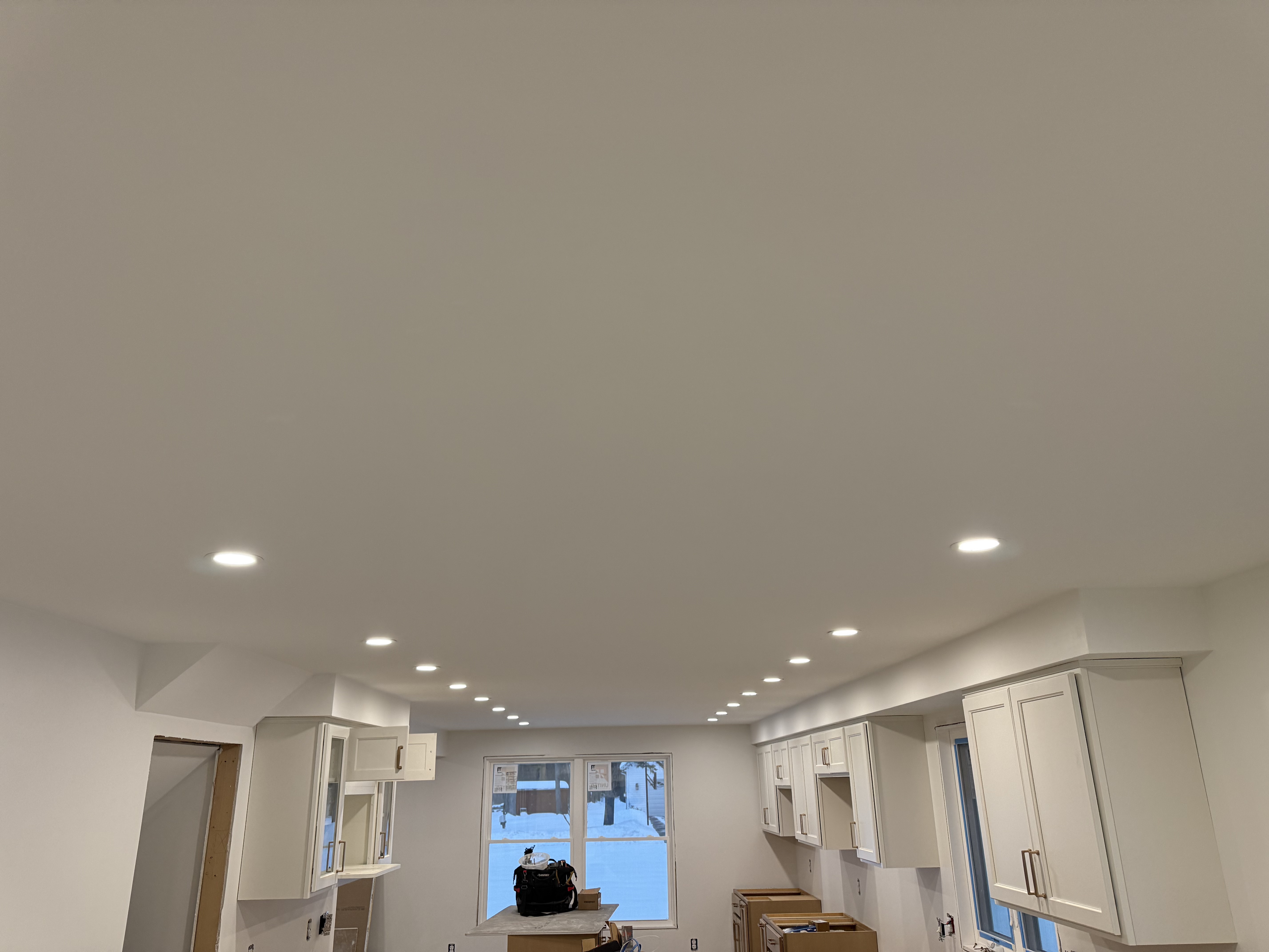 Recessed LED lighting installation residential kitchen by licensed electrician Rochester NY