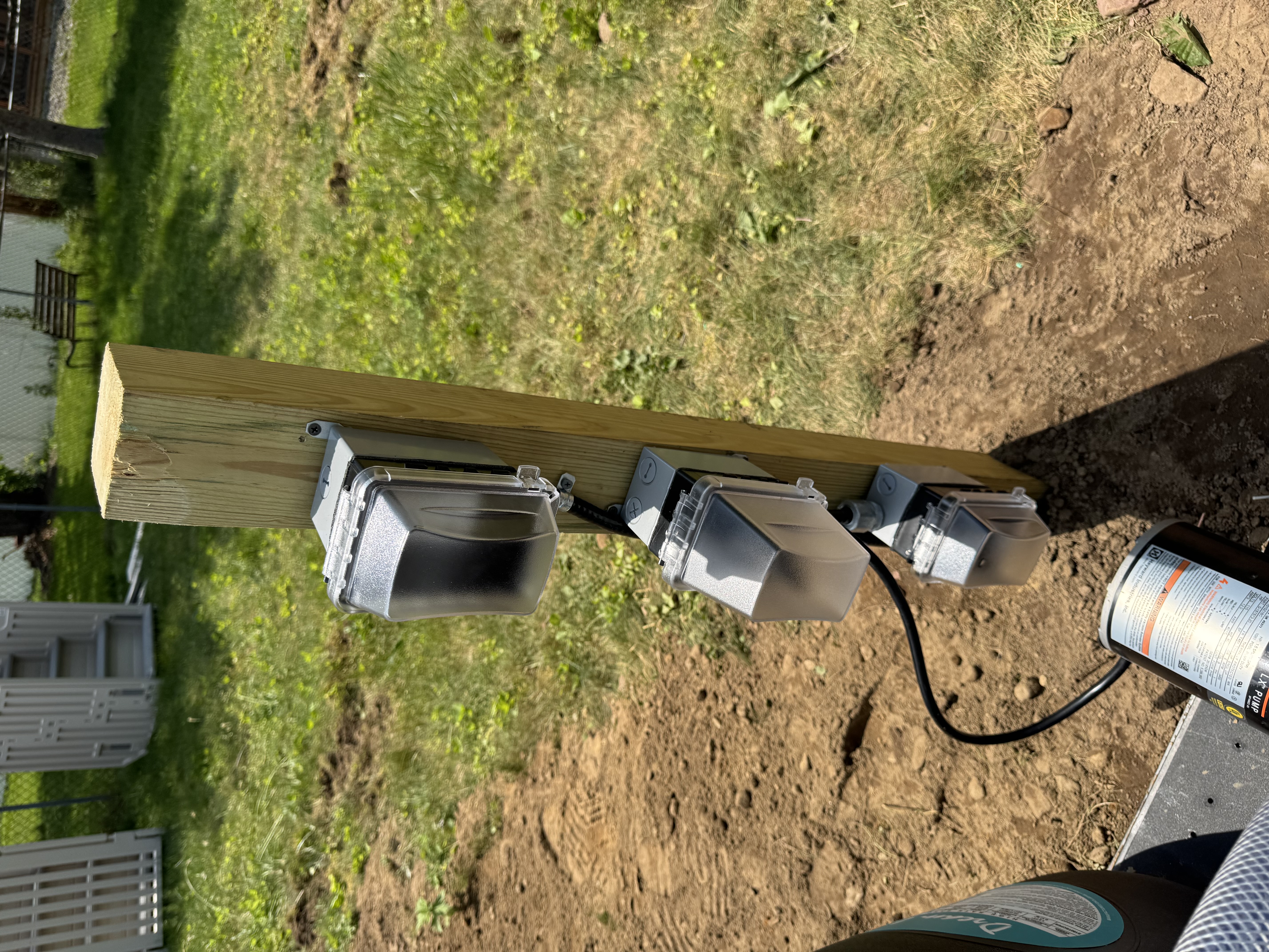 Outdoor weatherproof GFCI outlet post for pool hot tub hookup by Premier Electric Rochester NY